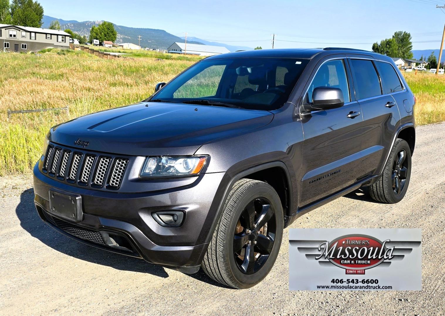 2014 Grey /Black Jeep Grand Cherokee Laredo 4WD (1C4RJFAG3EC) with an 3.6L V6 DOHC 24V engine, 5-Speed Automatic transmission, located at 450 N Russell, Missoula, MT, 59801, (406) 543-6600, 46.874496, -114.017433 - Stylish Jeep Grand Cherokee Altitude AWD. Reliable 3.6L V6 Engine. Heated Front Seats. Heated Steering Wheel. Power Sunroof. Power Windows and Locks. AM FM XM. Bluetooth Audio and Phone Connection. Toyo Tires. Power Liftgate. Very Comfortable to drive. We Finance through local Credit Unions. W- Photo#3