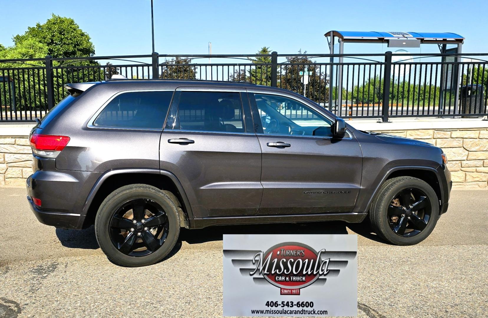 2014 Grey /Black Jeep Grand Cherokee Laredo 4WD (1C4RJFAG3EC) with an 3.6L V6 DOHC 24V engine, 5-Speed Automatic transmission, located at 450 N Russell, Missoula, MT, 59801, (406) 543-6600, 46.874496, -114.017433 - Stylish Jeep Grand Cherokee Altitude AWD. Reliable 3.6L V6 Engine. Heated Front Seats. Heated Steering Wheel. Power Sunroof. Power Windows and Locks. AM FM XM. Bluetooth Audio and Phone Connection. Toyo Tires. Power Liftgate. Very Comfortable to drive. We Finance through local Credit Unions. W- Photo#4