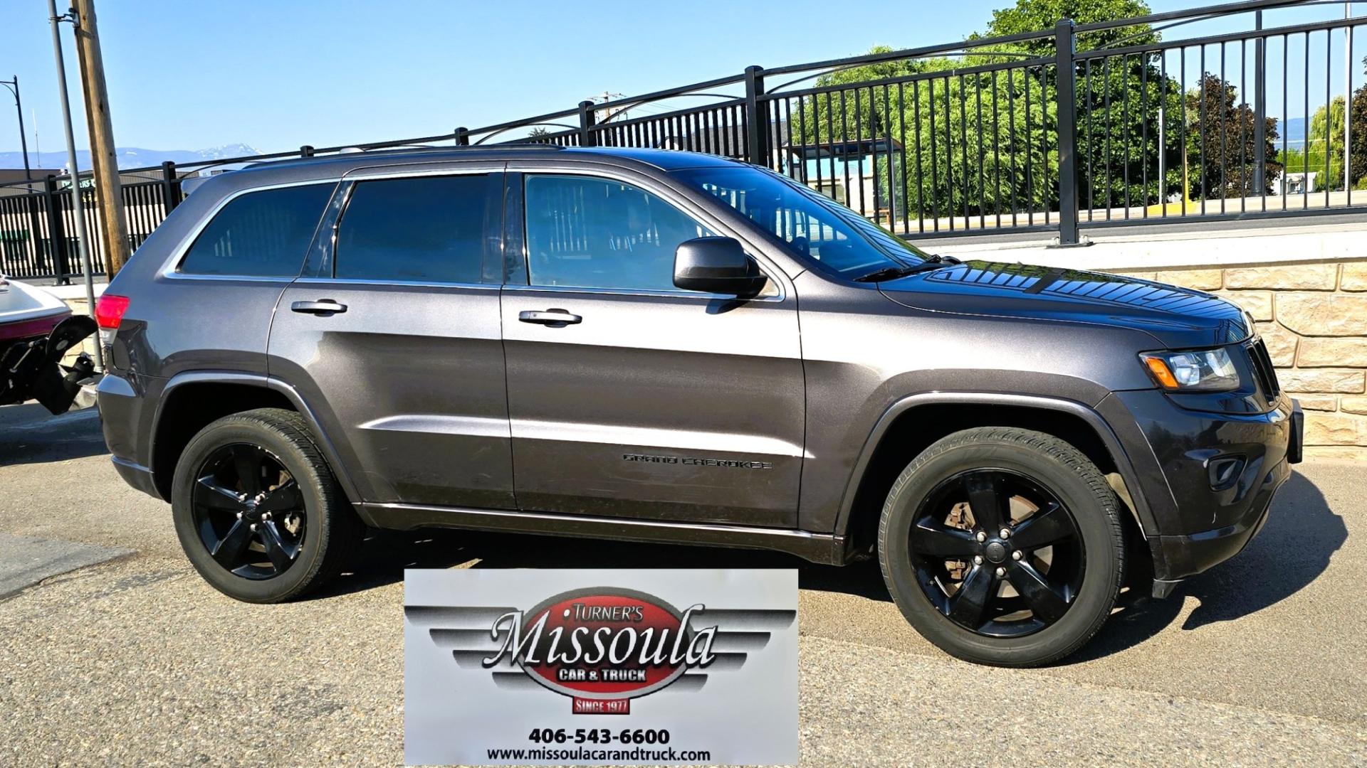 2014 Grey /Black Jeep Grand Cherokee Laredo 4WD (1C4RJFAG3EC) with an 3.6L V6 DOHC 24V engine, 5-Speed Automatic transmission, located at 450 N Russell, Missoula, MT, 59801, (406) 543-6600, 46.874496, -114.017433 - Stylish Jeep Grand Cherokee Altitude AWD. Reliable 3.6L V6 Engine. Heated Front Seats. Heated Steering Wheel. Power Sunroof. Power Windows and Locks. AM FM XM. Bluetooth Audio and Phone Connection. Toyo Tires. Power Liftgate. Very Comfortable to drive. We Finance through local Credit Unions. W- Photo#5