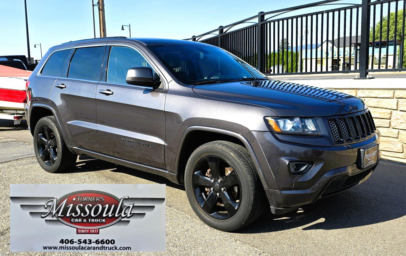 2014 Grey /Black Jeep Grand Cherokee Laredo 4WD (1C4RJFAG3EC) with an 3.6L V6 DOHC 24V engine, 5-Speed Automatic transmission, located at 450 N Russell, Missoula, MT, 59801, (406) 543-6600, 46.874496, -114.017433 - Stylish Jeep Grand Cherokee Altitude AWD. Reliable 3.6L V6 Engine. Heated Front Seats. Heated Steering Wheel. Power Sunroof. Power Windows and Locks. AM FM XM. Bluetooth Audio and Phone Connection. Toyo Tires. Power Liftgate. Very Comfortable to drive. We Finance through local Credit Unions. W- Photo#7