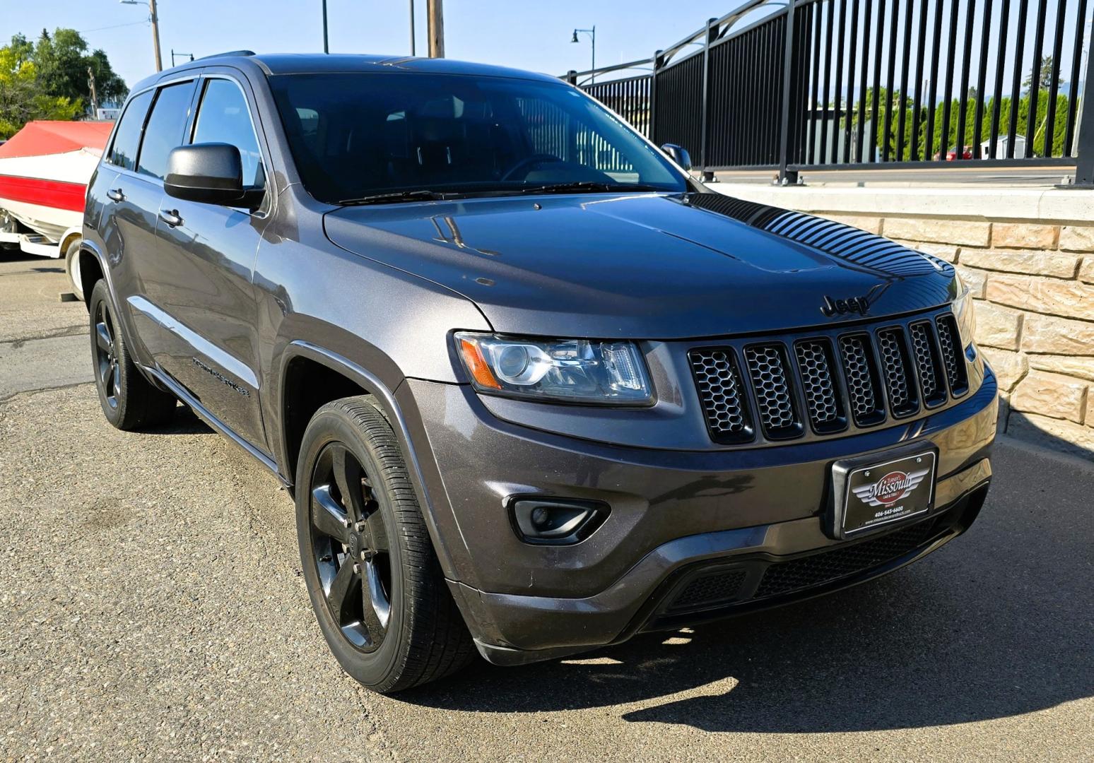 2014 Grey /Black Jeep Grand Cherokee Laredo 4WD (1C4RJFAG3EC) with an 3.6L V6 DOHC 24V engine, 5-Speed Automatic transmission, located at 450 N Russell, Missoula, MT, 59801, (406) 543-6600, 46.874496, -114.017433 - Stylish Jeep Grand Cherokee Altitude AWD. Reliable 3.6L V6 Engine. Heated Front Seats. Heated Steering Wheel. Power Sunroof. Power Windows and Locks. AM FM XM. Bluetooth Audio and Phone Connection. Toyo Tires. Power Liftgate. Very Comfortable to drive. We Finance through local Credit Unions. W- Photo#8