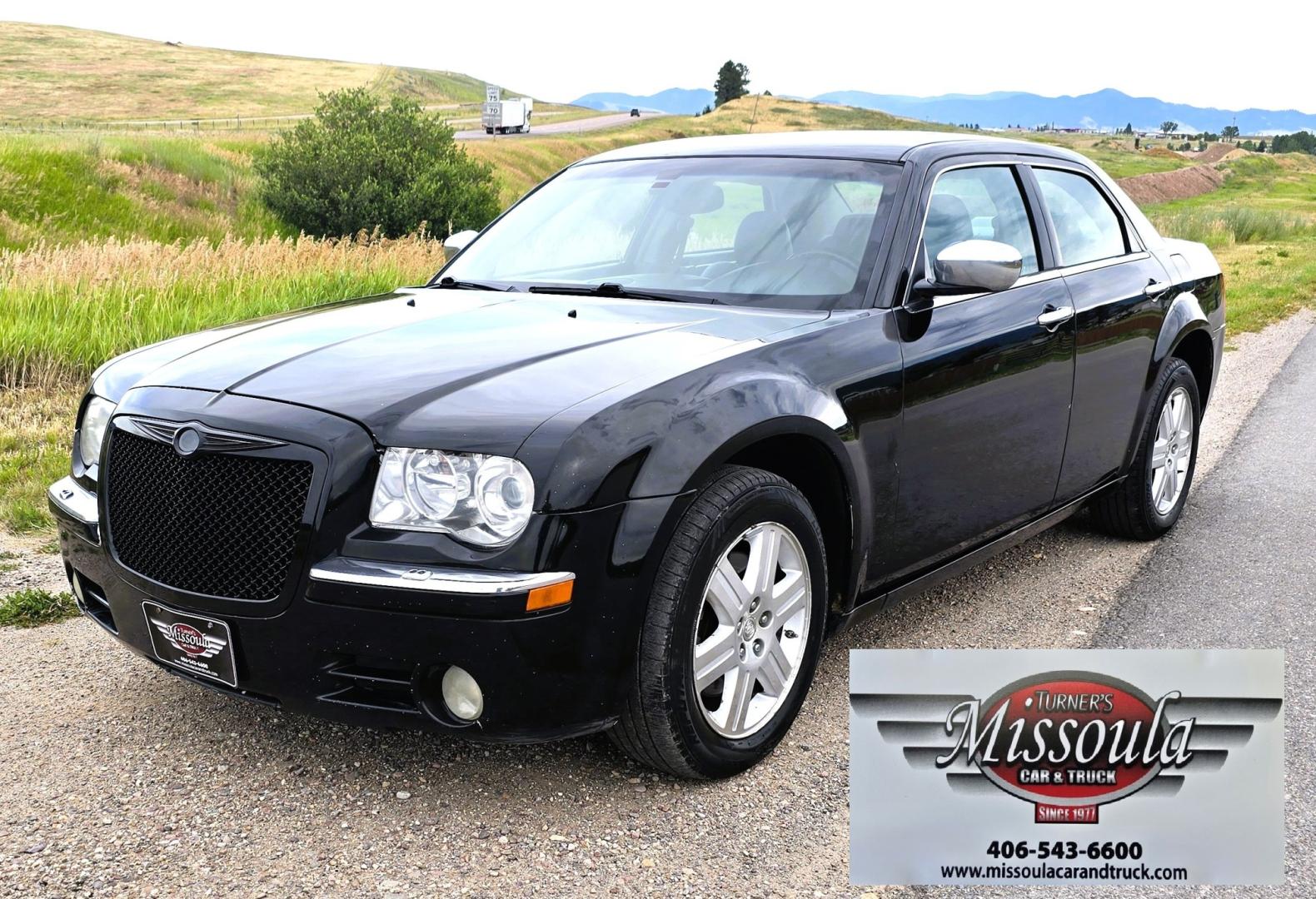 2006 Black /Black Chrysler 300 C AWD (2C3KK63H36H) with an 5.7L V8 OHV 16V engine, 5A OD transmission, located at 450 N Russell, Missoula, MT, 59801, (406) 543-6600, 46.874496, -114.017433 - Tons of Power with a 5.7L V8 Hemi Engine. Comfortable to drive. 5 Speed Automatic Overdrive Transmission. AWD. Heated Power Front Seats. Air Conditioning. CRusie Control. Power Windows and Locks. Aftermarket Touch Screen Stereo. Because oft he age of this vehicle, our lenders do NOT offer finan- Photo#2
