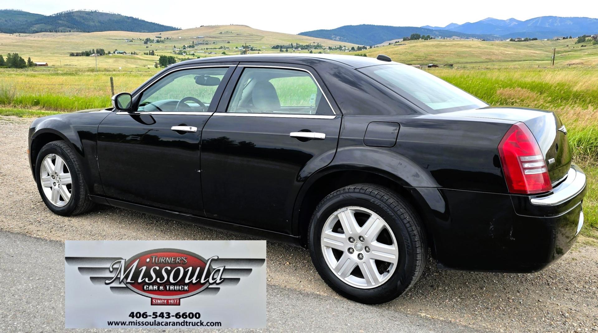 2006 Black /Black Chrysler 300 C AWD (2C3KK63H36H) with an 5.7L V8 OHV 16V engine, 5A OD transmission, located at 450 N Russell, Missoula, MT, 59801, (406) 543-6600, 46.874496, -114.017433 - Tons of Power with a 5.7L V8 Hemi Engine. Comfortable to drive. 5 Speed Automatic Overdrive Transmission. AWD. Heated Power Front Seats. Air Conditioning. CRusie Control. Power Windows and Locks. Aftermarket Touch Screen Stereo. Because oft he age of this vehicle, our lenders do NOT offer finan- Photo#3