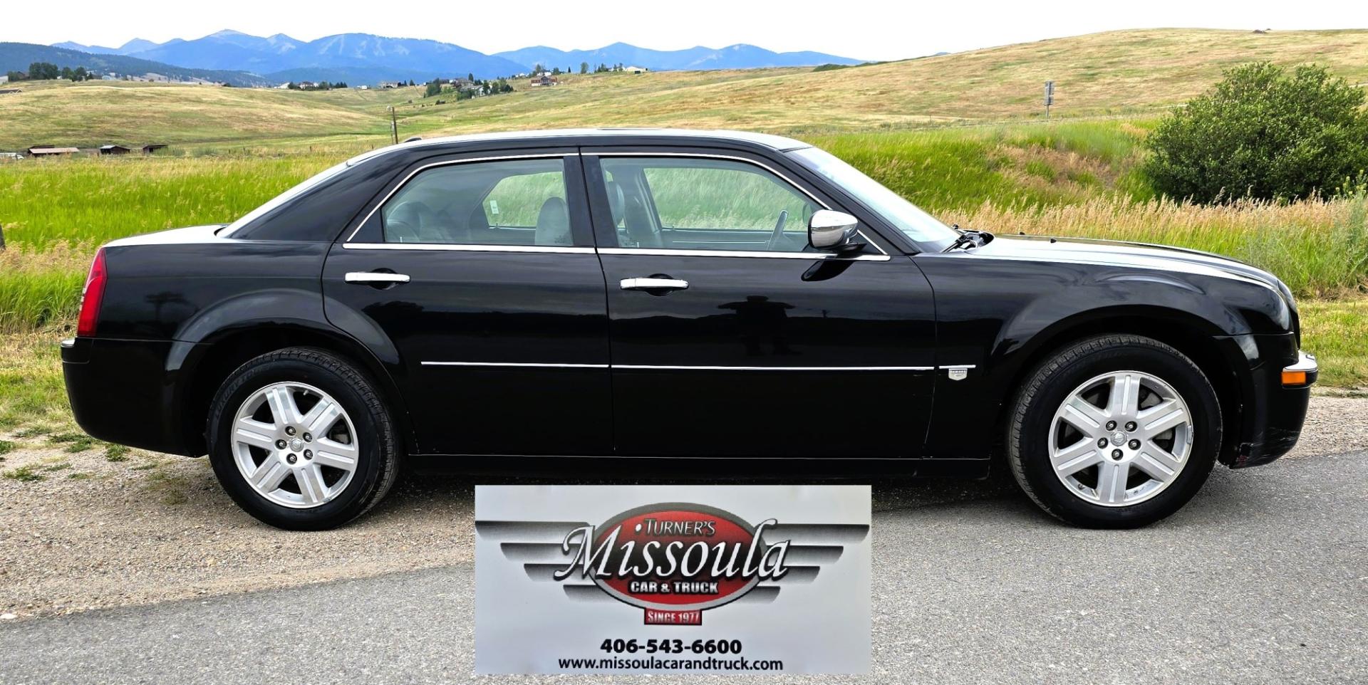 2006 Black /Black Chrysler 300 C AWD (2C3KK63H36H) with an 5.7L V8 OHV 16V engine, 5A OD transmission, located at 450 N Russell, Missoula, MT, 59801, (406) 543-6600, 46.874496, -114.017433 - Tons of Power with a 5.7L V8 Hemi Engine. Comfortable to drive. 5 Speed Automatic Overdrive Transmission. AWD. Heated Power Front Seats. Air Conditioning. CRusie Control. Power Windows and Locks. Aftermarket Touch Screen Stereo. Because oft he age of this vehicle, our lenders do NOT offer finan- Photo#6