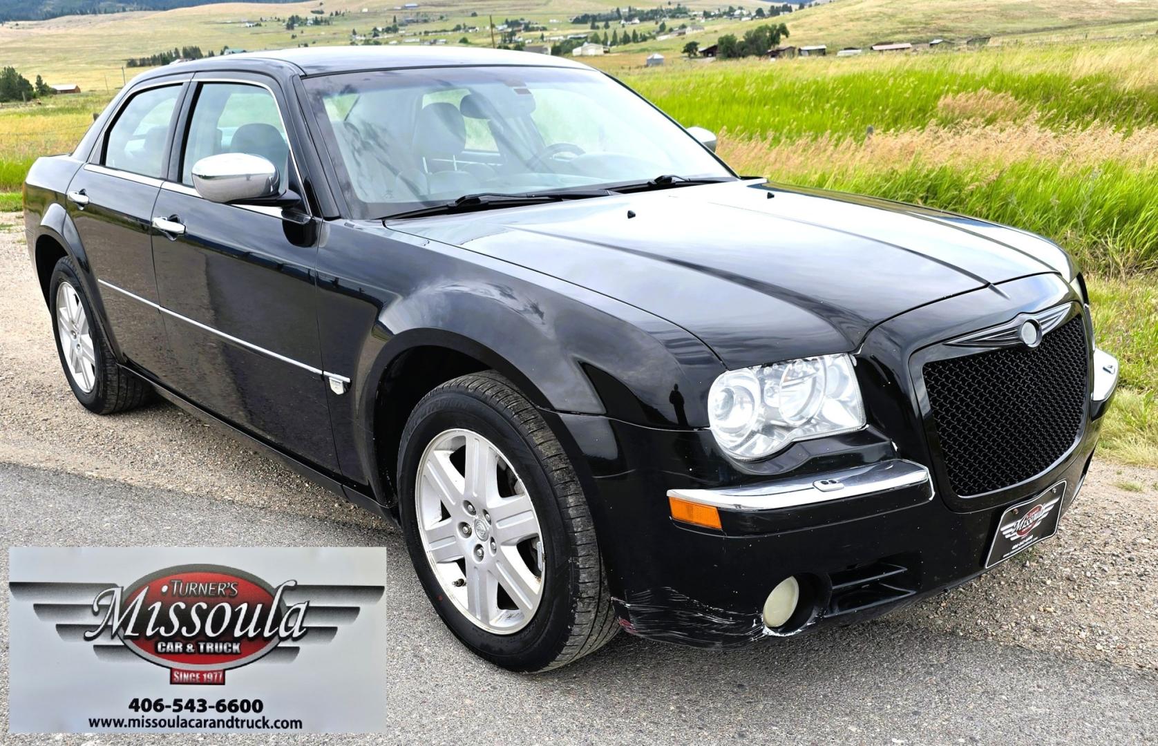 2006 Black /Black Chrysler 300 C AWD (2C3KK63H36H) with an 5.7L V8 OHV 16V engine, 5A OD transmission, located at 450 N Russell, Missoula, MT, 59801, (406) 543-6600, 46.874496, -114.017433 - Tons of Power with a 5.7L V8 Hemi Engine. Comfortable to drive. 5 Speed Automatic Overdrive Transmission. AWD. Heated Power Front Seats. Air Conditioning. CRusie Control. Power Windows and Locks. Aftermarket Touch Screen Stereo. Because oft he age of this vehicle, our lenders do NOT offer finan- Photo#8