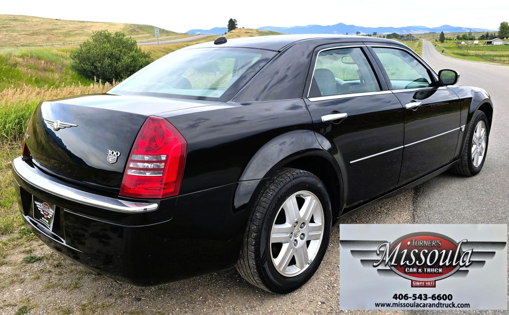 2006 Black /Black Chrysler 300 C AWD (2C3KK63H36H) with an 5.7L V8 OHV 16V engine, 5A OD transmission, located at 450 N Russell, Missoula, MT, 59801, (406) 543-6600, 46.874496, -114.017433 - Tons of Power with a 5.7L V8 Hemi Engine. Comfortable to drive. 5 Speed Automatic Overdrive Transmission. AWD. Heated Power Front Seats. Air Conditioning. CRusie Control. Power Windows and Locks. Aftermarket Touch Screen Stereo. Because oft he age of this vehicle, our lenders do NOT offer finan- Photo#9