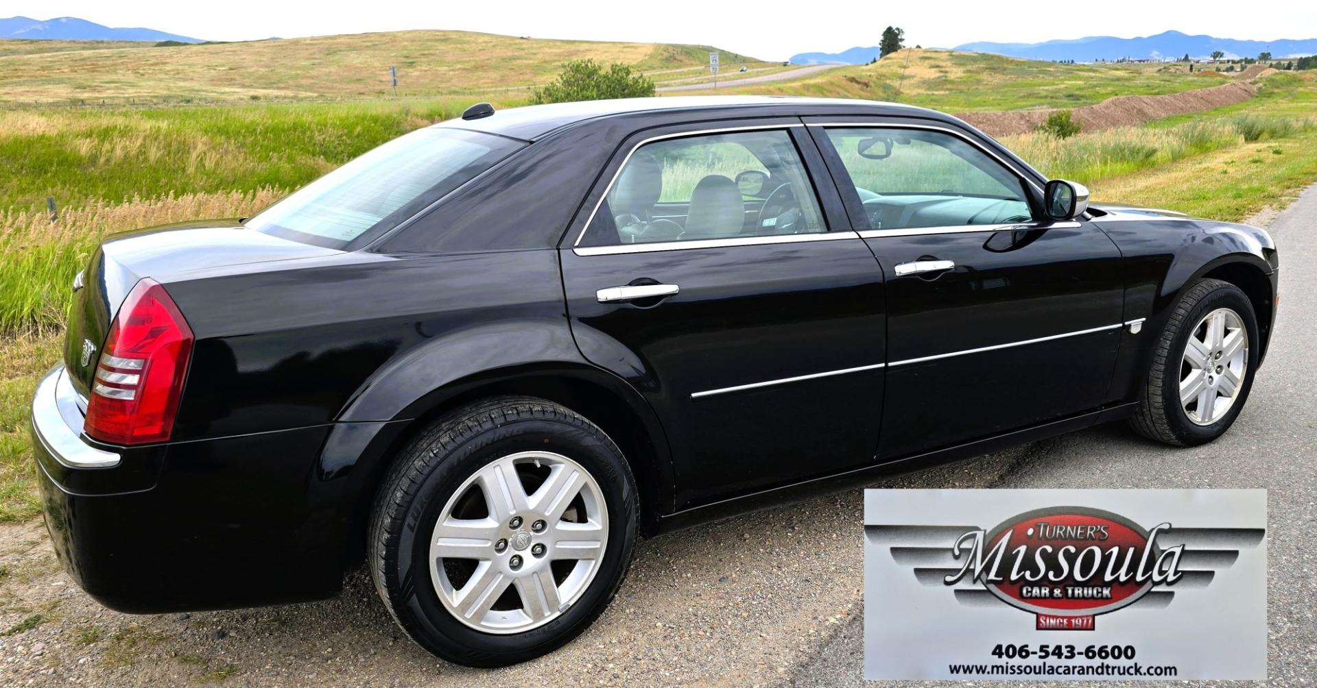 2006 Black /Black Chrysler 300 C AWD (2C3KK63H36H) with an 5.7L V8 OHV 16V engine, 5A OD transmission, located at 450 N Russell, Missoula, MT, 59801, (406) 543-6600, 46.874496, -114.017433 - Tons of Power with a 5.7L V8 Hemi Engine. Comfortable to drive. 5 Speed Automatic Overdrive Transmission. AWD. Heated Power Front Seats. Air Conditioning. CRusie Control. Power Windows and Locks. Aftermarket Touch Screen Stereo. Because oft he age of this vehicle, our lenders do NOT offer finan- Photo#10