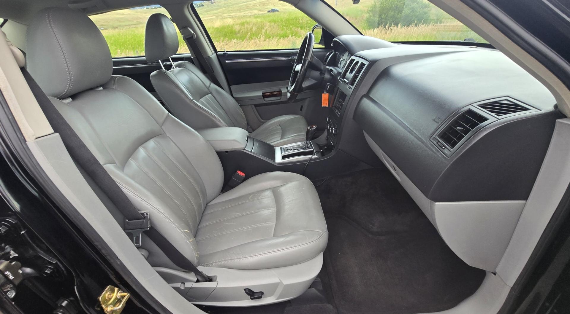 2006 Black /Black Chrysler 300 C AWD (2C3KK63H36H) with an 5.7L V8 OHV 16V engine, 5A OD transmission, located at 450 N Russell, Missoula, MT, 59801, (406) 543-6600, 46.874496, -114.017433 - Tons of Power with a 5.7L V8 Hemi Engine. Comfortable to drive. 5 Speed Automatic Overdrive Transmission. AWD. Heated Power Front Seats. Air Conditioning. CRusie Control. Power Windows and Locks. Aftermarket Touch Screen Stereo. Because oft he age of this vehicle, our lenders do NOT offer finan- Photo#12