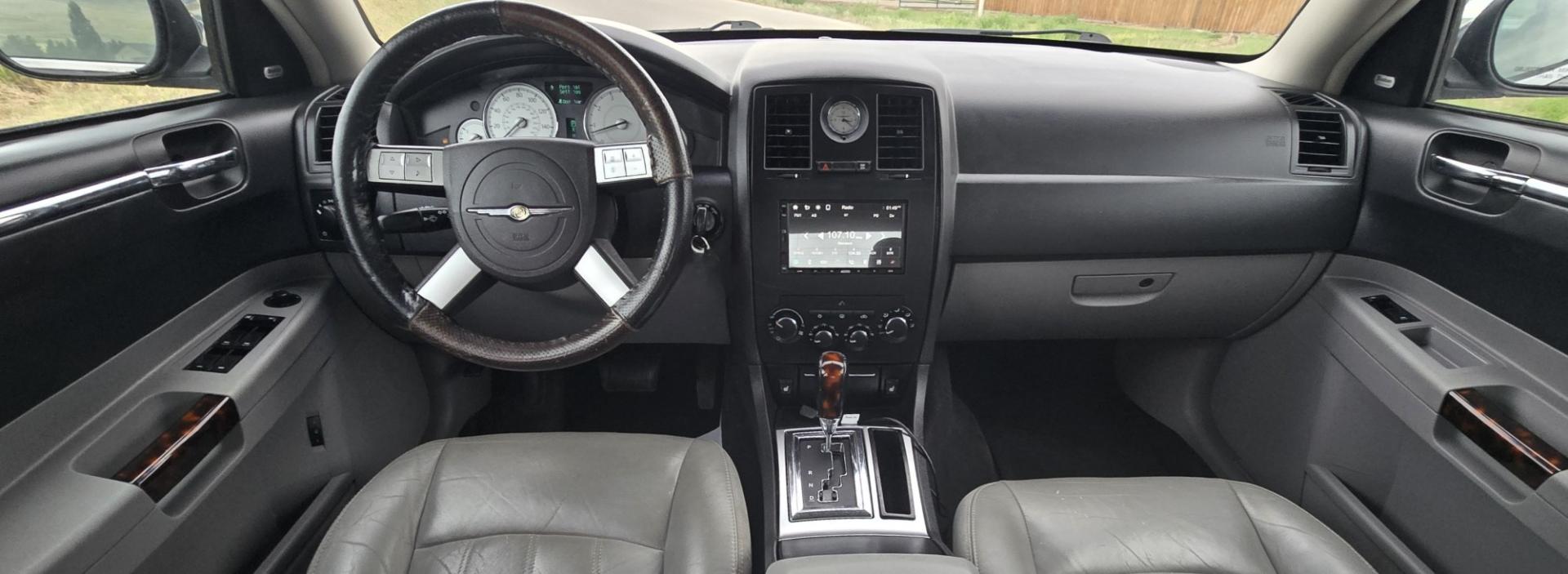 2006 Black /Black Chrysler 300 C AWD (2C3KK63H36H) with an 5.7L V8 OHV 16V engine, 5A OD transmission, located at 450 N Russell, Missoula, MT, 59801, (406) 543-6600, 46.874496, -114.017433 - Tons of Power with a 5.7L V8 Hemi Engine. Comfortable to drive. 5 Speed Automatic Overdrive Transmission. AWD. Heated Power Front Seats. Air Conditioning. CRusie Control. Power Windows and Locks. Aftermarket Touch Screen Stereo. Because oft he age of this vehicle, our lenders do NOT offer finan- Photo#14