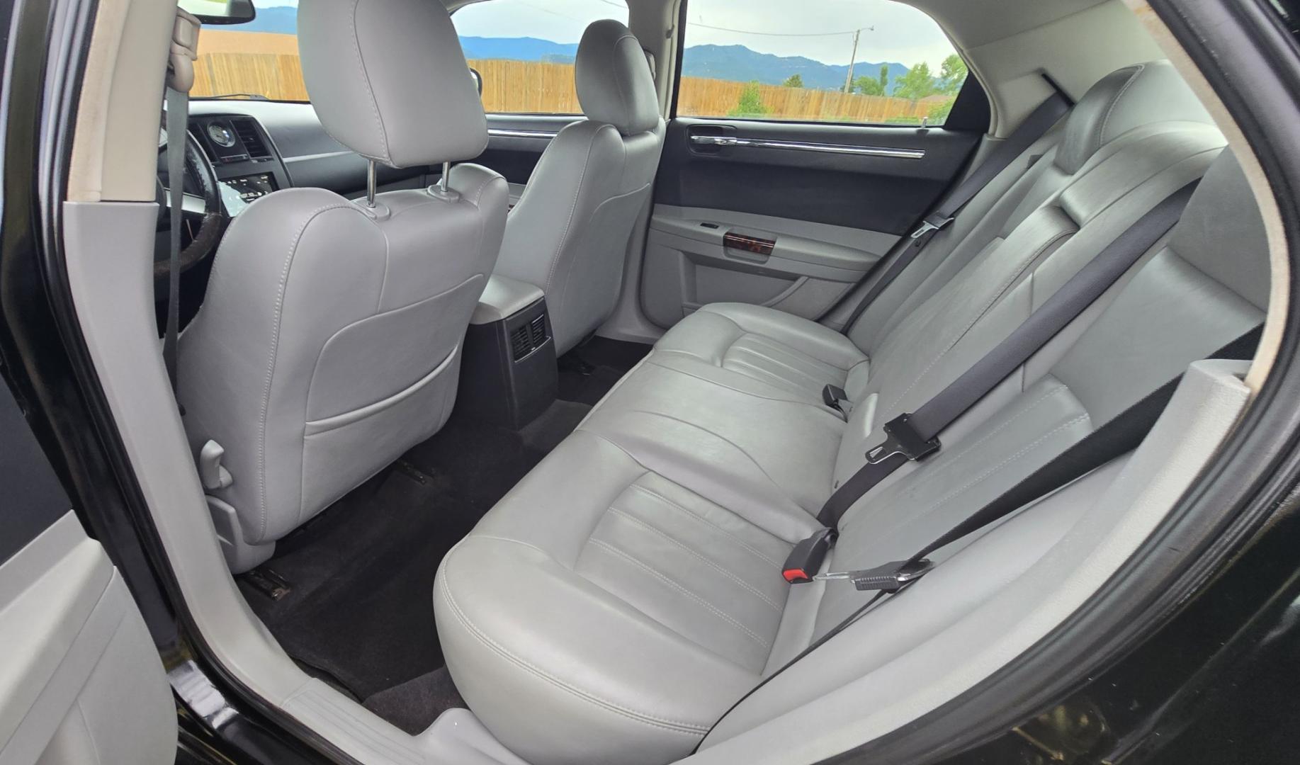 2006 Black /Black Chrysler 300 C AWD (2C3KK63H36H) with an 5.7L V8 OHV 16V engine, 5A OD transmission, located at 450 N Russell, Missoula, MT, 59801, (406) 543-6600, 46.874496, -114.017433 - Tons of Power with a 5.7L V8 Hemi Engine. Comfortable to drive. 5 Speed Automatic Overdrive Transmission. AWD. Heated Power Front Seats. Air Conditioning. CRusie Control. Power Windows and Locks. Aftermarket Touch Screen Stereo. Because oft he age of this vehicle, our lenders do NOT offer finan- Photo#13