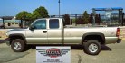 2002 Pewter /Brown Chevrolet Silverado 2500HD Ext. Cab Long Bed 4WD (1GCHK29U62E) with an 6.0L V8 OHV 16V engine, Automatic transmission, located at 450 N Russell, Missoula, MT, 59801, (406) 543-6600, 46.874496, -114.017433 - You read that right. Only 63,239 Miles. 4WD. 6.0L V8 Engine. Long Box. Extended Cab 4 Door. Automatic Transmission. Body is Very Straight. Air Conditioning. Cruise Control. Tilt Steering. Power Windows and Locks. Aftermarket Touch Screen Stereo with Bluetooth Audio and Phone Connection. Clean Title- Photo#4