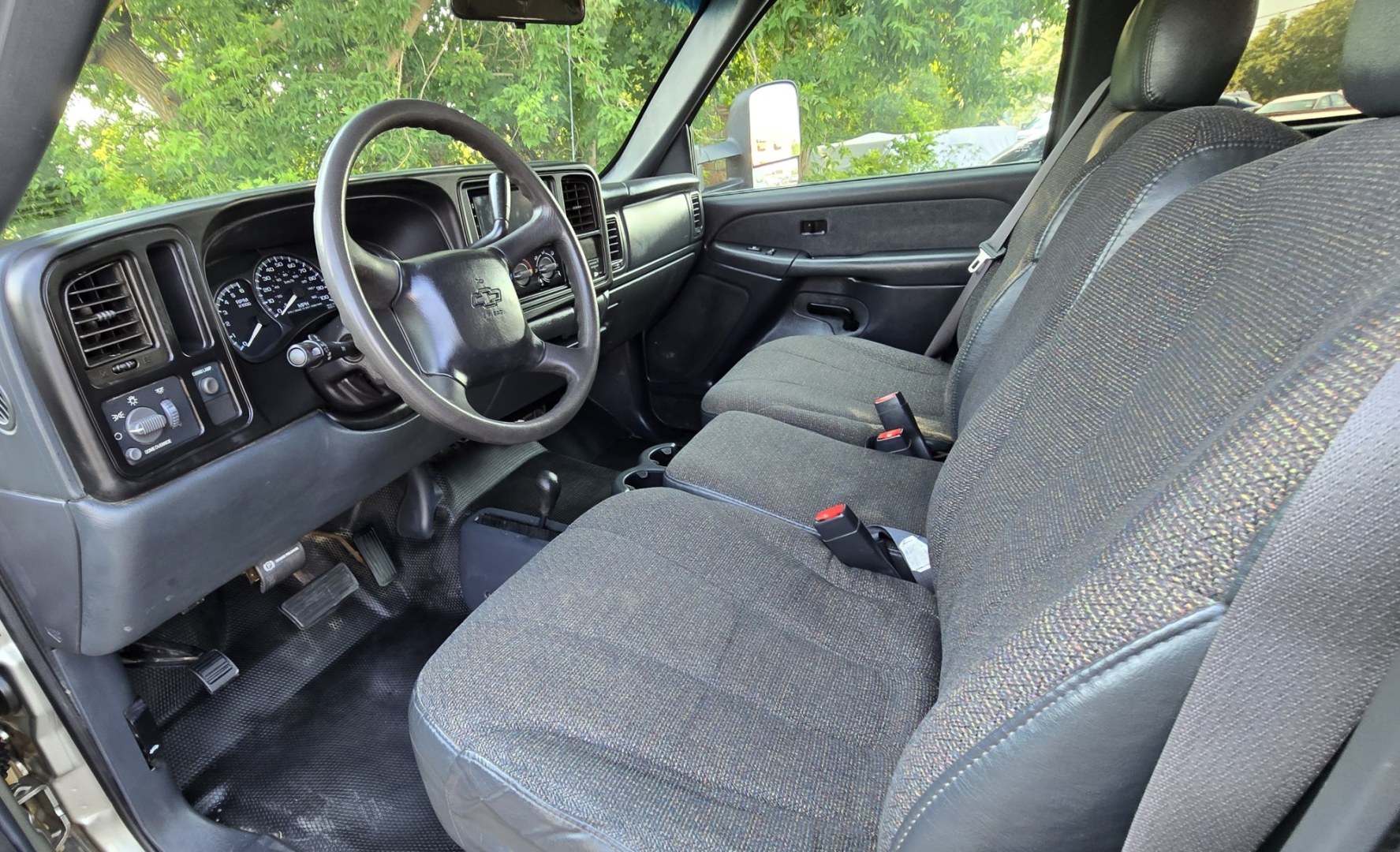 2002 Pewter /Brown Chevrolet Silverado 2500HD Ext. Cab Long Bed 4WD (1GCHK29U62E) with an 6.0L V8 OHV 16V engine, Automatic transmission, located at 450 N Russell, Missoula, MT, 59801, (406) 543-6600, 46.874496, -114.017433 - You read that right. Only 63,239 Miles. 4WD. 6.0L V8 Engine. Long Box. Extended Cab 4 Door. Automatic Transmission. Body is Very Straight. Air Conditioning. Cruise Control. Tilt Steering. Power Windows and Locks. Aftermarket Touch Screen Stereo with Bluetooth Audio and Phone Connection. Clean Title- Photo#13