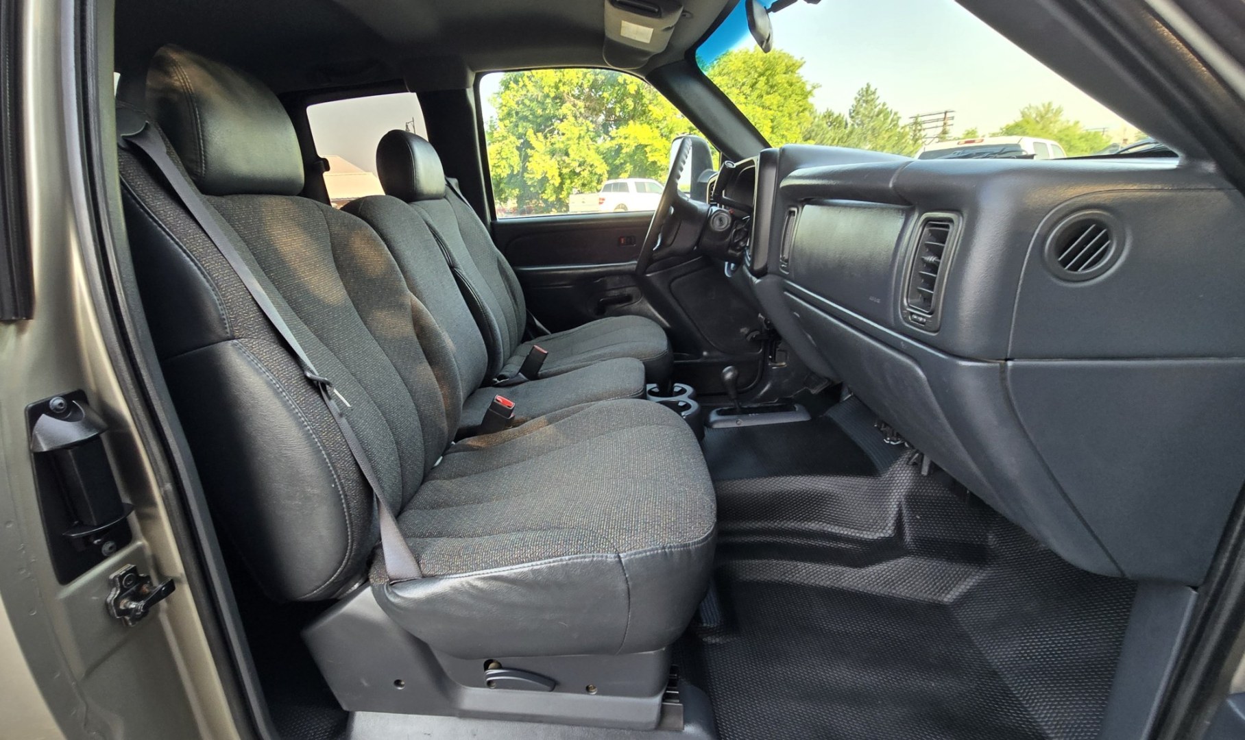 2002 Pewter /Brown Chevrolet Silverado 2500HD Ext. Cab Long Bed 4WD (1GCHK29U62E) with an 6.0L V8 OHV 16V engine, Automatic transmission, located at 450 N Russell, Missoula, MT, 59801, (406) 543-6600, 46.874496, -114.017433 - You read that right. Only 63,239 Miles. 4WD. 6.0L V8 Engine. Long Box. Extended Cab 4 Door. Automatic Transmission. Body is Very Straight. Air Conditioning. Cruise Control. Tilt Steering. Power Windows and Locks. Aftermarket Touch Screen Stereo with Bluetooth Audio and Phone Connection. Clean Title- Photo#15