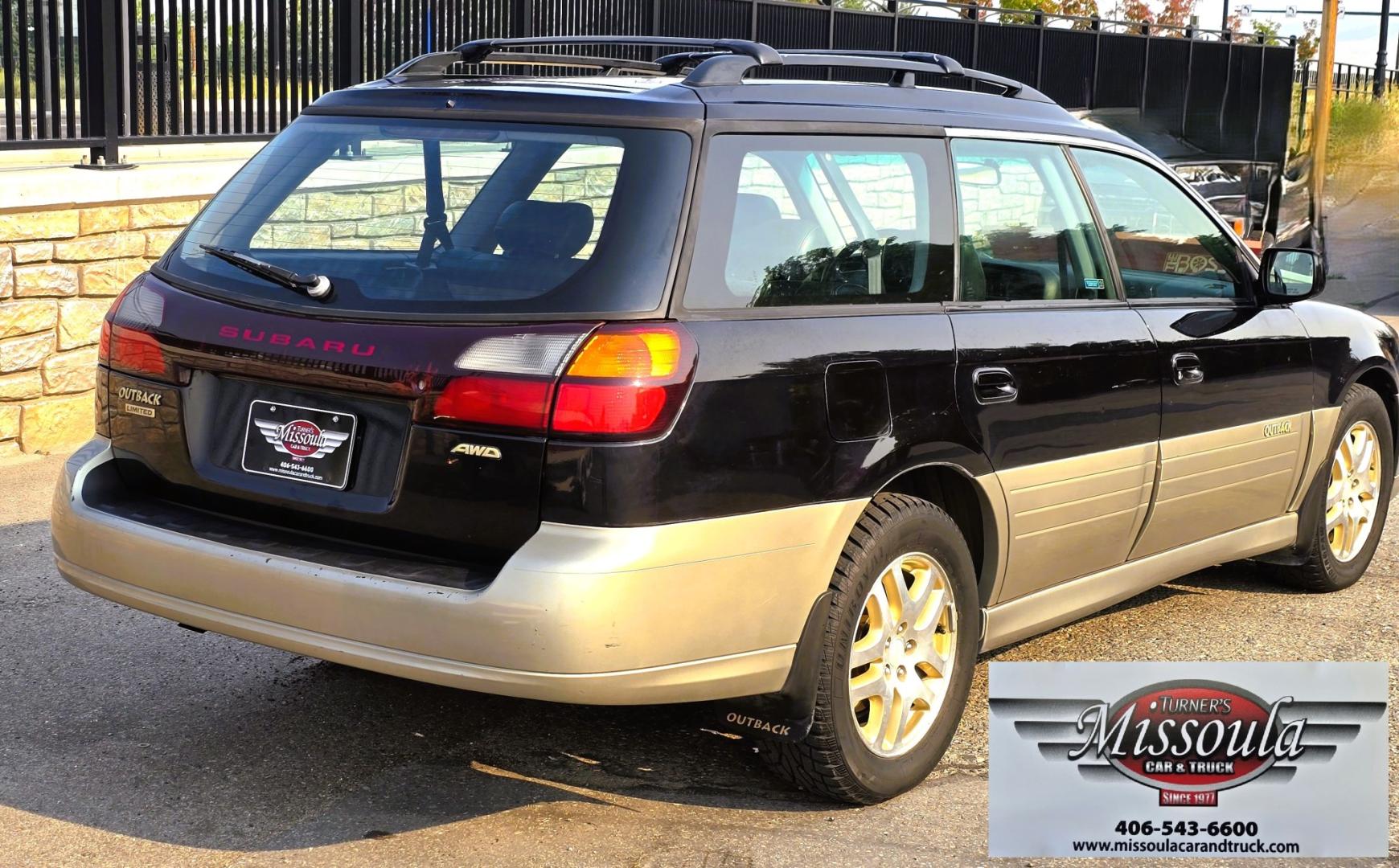 2001 Black /Black Subaru Outback Limited Wagon (4S3BH686717) with an 2.5L H4 SOHC 16V engine, 4A OD transmission, located at 450 N Russell, Missoula, MT, 59801, (406) 543-6600, 46.874496, -114.017433 - Reliable AWD Suby that runs amazing. 2.5L H4 Engine. Automatic Transmission. Sunroof. Air. Cruise. Tilt. Power Windows and Locks. Tires are in Excellent Condition. Paint is a little rough. Clean Title and Carfax. Because of the age, our lenders do NOT offer financing on this vehicle- Photo#4