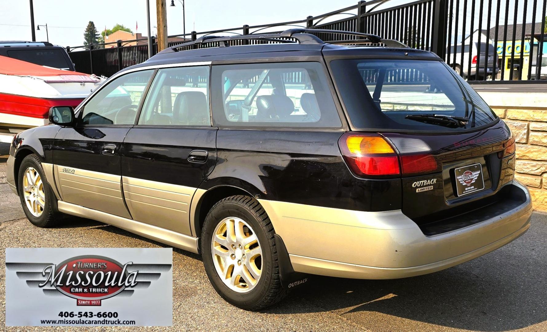 2001 Black /Black Subaru Outback Limited Wagon (4S3BH686717) with an 2.5L H4 SOHC 16V engine, 4A OD transmission, located at 450 N Russell, Missoula, MT, 59801, (406) 543-6600, 46.874496, -114.017433 - Reliable AWD Suby that runs amazing. 2.5L H4 Engine. Automatic Transmission. Sunroof. Air. Cruise. Tilt. Power Windows and Locks. Tires are in Excellent Condition. Paint is a little rough. Clean Title and Carfax. Because of the age, our lenders do NOT offer financing on this vehicle- Photo#1