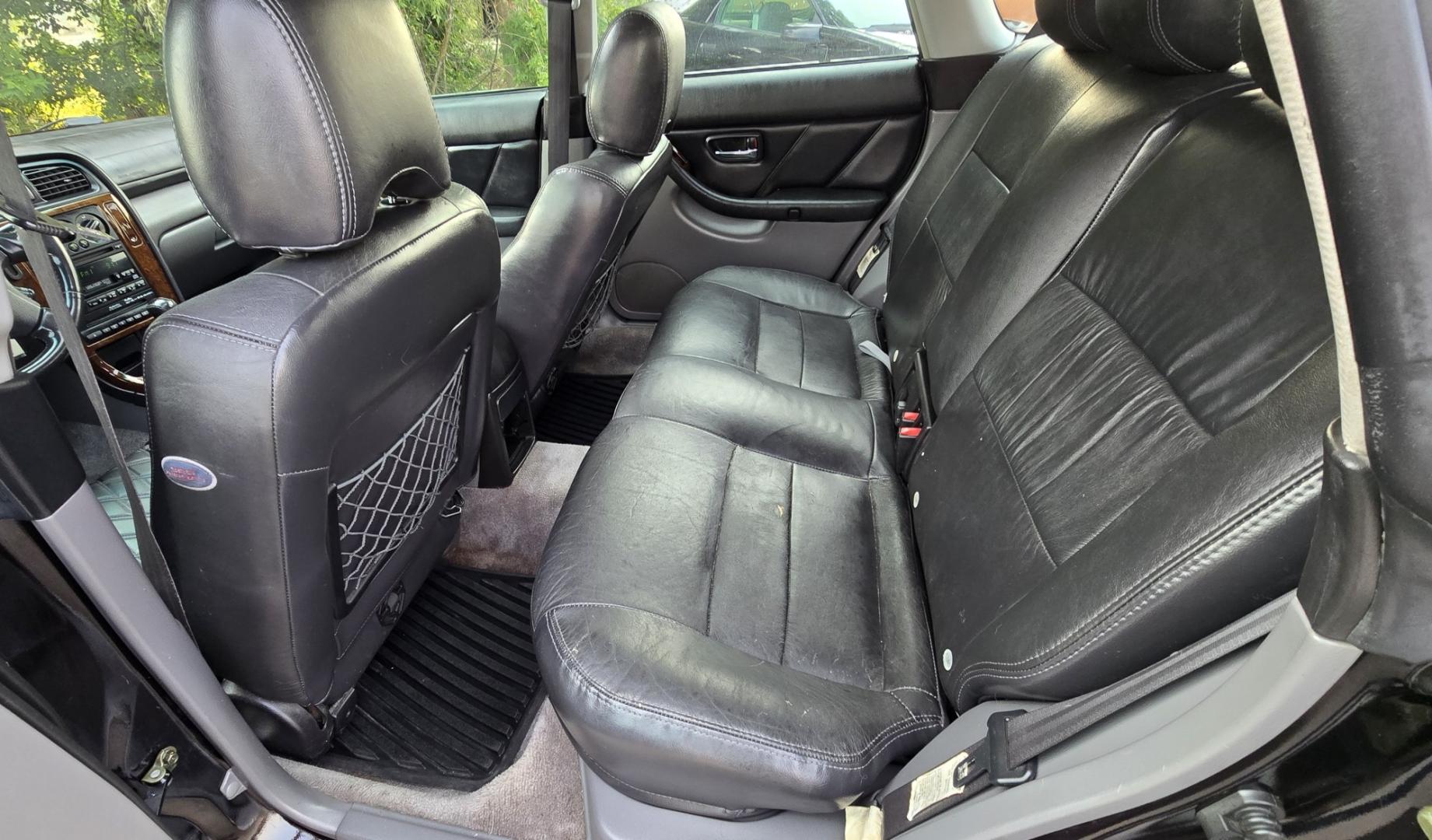 2001 Black /Black Subaru Outback Limited Wagon (4S3BH686717) with an 2.5L H4 SOHC 16V engine, 4A OD transmission, located at 450 N Russell, Missoula, MT, 59801, (406) 543-6600, 46.874496, -114.017433 - Reliable AWD Suby that runs amazing. 2.5L H4 Engine. Automatic Transmission. Sunroof. Air. Cruise. Tilt. Power Windows and Locks. Tires are in Excellent Condition. Paint is a little rough. Clean Title and Carfax. Because of the age, our lenders do NOT offer financing on this vehicle- Photo#14