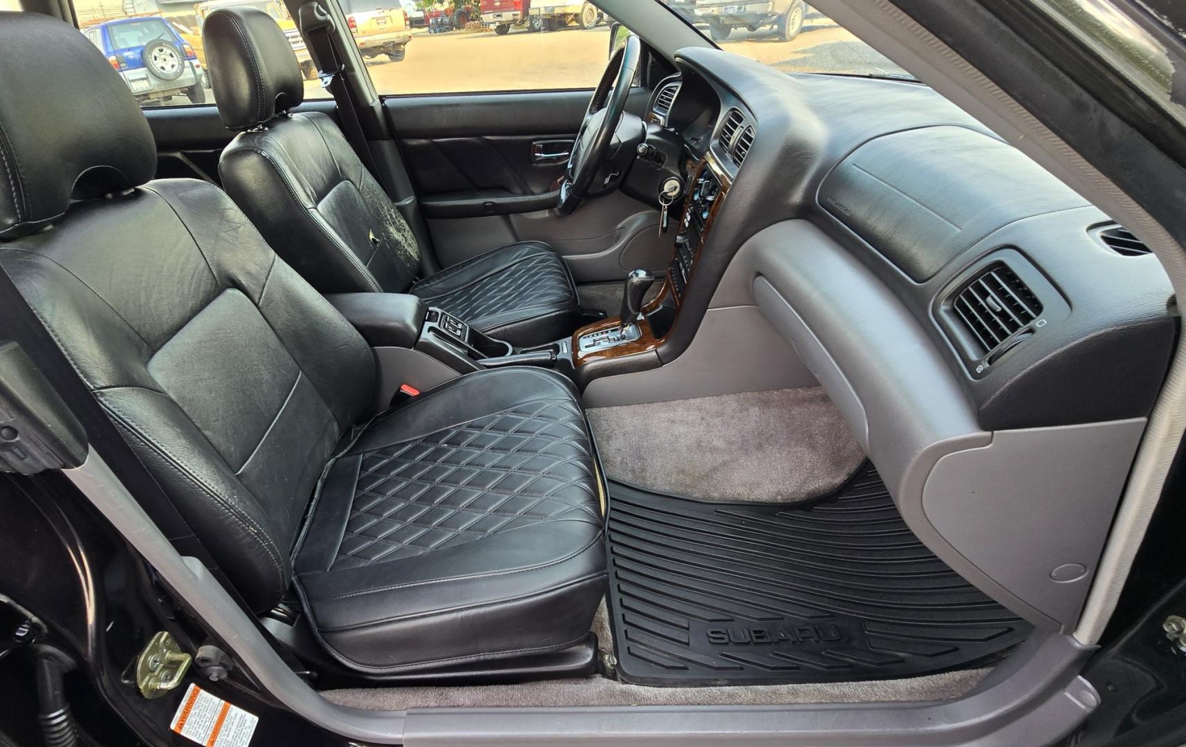 2001 Black /Black Subaru Outback Limited Wagon (4S3BH686717) with an 2.5L H4 SOHC 16V engine, 4A OD transmission, located at 450 N Russell, Missoula, MT, 59801, (406) 543-6600, 46.874496, -114.017433 - Reliable AWD Suby that runs amazing. 2.5L H4 Engine. Automatic Transmission. Sunroof. Air. Cruise. Tilt. Power Windows and Locks. Tires are in Excellent Condition. Paint is a little rough. Clean Title and Carfax. Because of the age, our lenders do NOT offer financing on this vehicle- Photo#16
