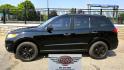 2012 Black /Black Hyundai Santa Fe Limited 3.5 4WD (5XYZKDAG4CG) with an 3.5L V6 DOHC 24V engine, 6-Speed Automatic transmission, located at 450 N Russell, Missoula, MT, 59801, (406) 543-6600, 46.874496, -114.017433 - Zippy AWD SUV. 3.5L V6 really Gets Up and Goes. The All Wheel Drive is perfect for Montana Winters. Power Windows and Locks. Air Conditioning that was just recently serviced. Heated Front Seats. Infinity Stereo System with AM FM XM Aux and CD Player. Bluetooth Audio and Phone. Steering Wheel Control- Photo#6
