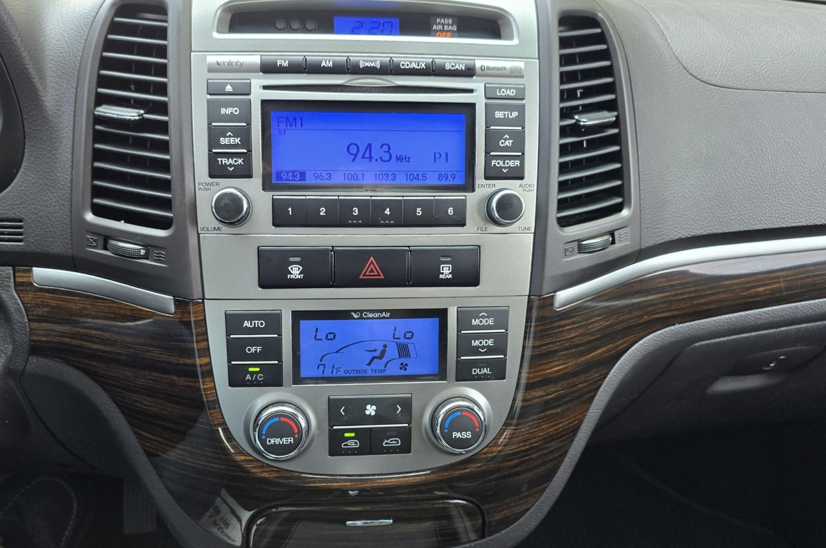 2012 Black /Black Hyundai Santa Fe Limited 3.5 4WD (5XYZKDAG4CG) with an 3.5L V6 DOHC 24V engine, 6-Speed Automatic transmission, located at 450 N Russell, Missoula, MT, 59801, (406) 543-6600, 46.874496, -114.017433 - Zippy AWD SUV. 3.5L V6 really Gets Up and Goes. The All Wheel Drive is perfect for Montana Winters. Power Windows and Locks. Air Conditioning that was just recently serviced. Heated Front Seats. Infinity Stereo System with AM FM XM Aux and CD Player. Bluetooth Audio and Phone. Steering Wheel Control- Photo#12