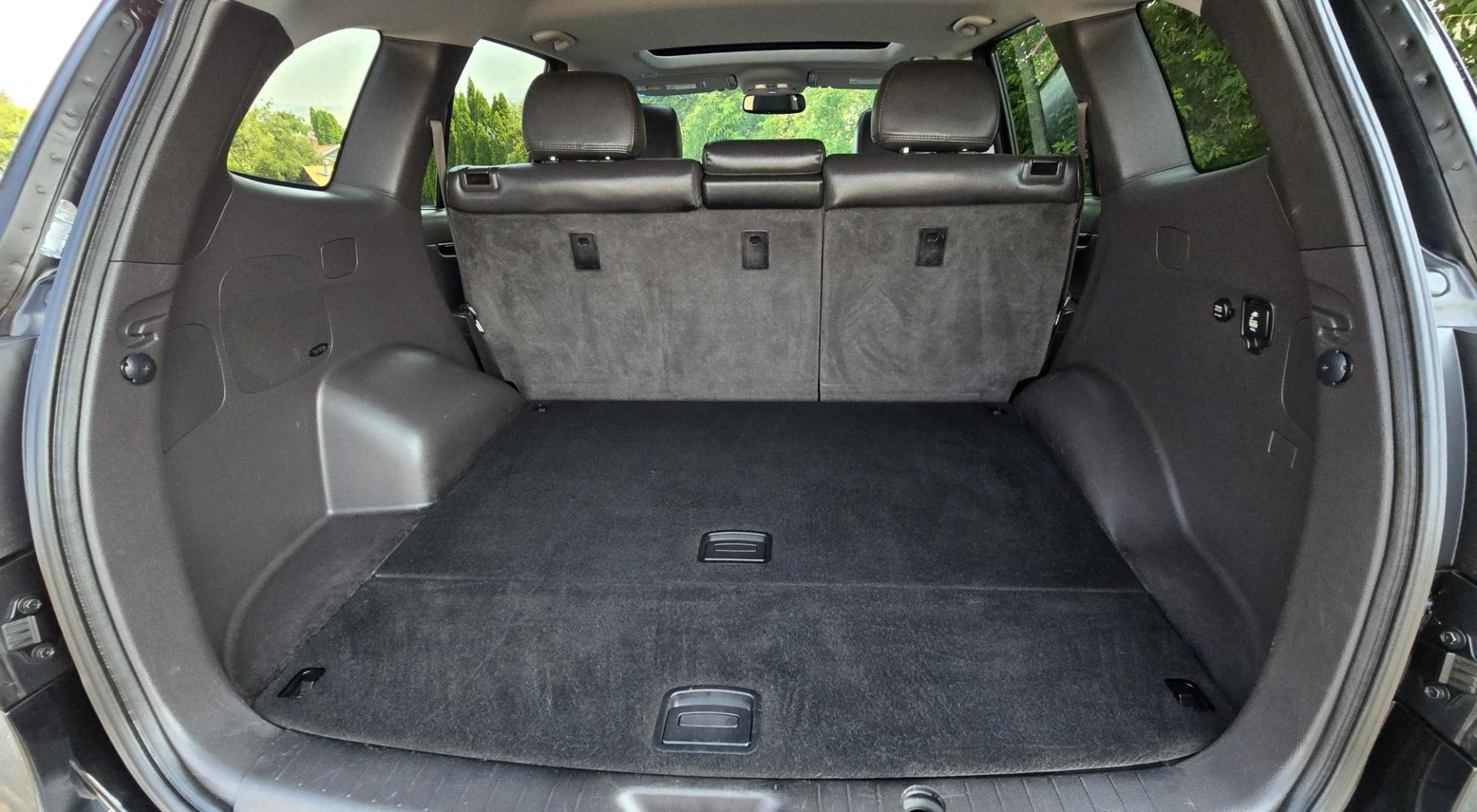 2012 Black /Black Hyundai Santa Fe Limited 3.5 4WD (5XYZKDAG4CG) with an 3.5L V6 DOHC 24V engine, 6-Speed Automatic transmission, located at 450 N Russell, Missoula, MT, 59801, (406) 543-6600, 46.874496, -114.017433 - Zippy AWD SUV. 3.5L V6 really Gets Up and Goes. The All Wheel Drive is perfect for Montana Winters. Power Windows and Locks. Air Conditioning that was just recently serviced. Heated Front Seats. Infinity Stereo System with AM FM XM Aux and CD Player. Bluetooth Audio and Phone. Steering Wheel Control- Photo#19