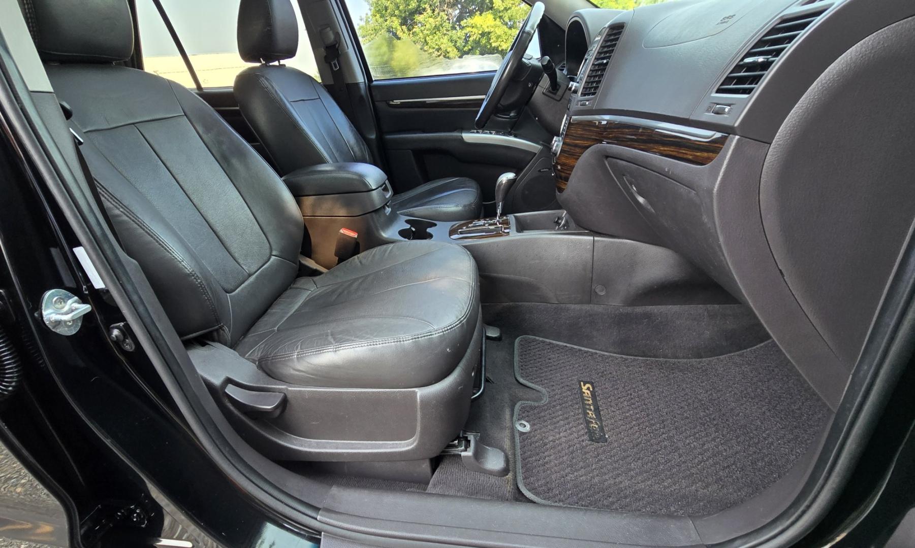 2012 Black /Black Hyundai Santa Fe Limited 3.5 4WD (5XYZKDAG4CG) with an 3.5L V6 DOHC 24V engine, 6-Speed Automatic transmission, located at 450 N Russell, Missoula, MT, 59801, (406) 543-6600, 46.874496, -114.017433 - Zippy AWD SUV. 3.5L V6 really Gets Up and Goes. The All Wheel Drive is perfect for Montana Winters. Power Windows and Locks. Air Conditioning that was just recently serviced. Heated Front Seats. Infinity Stereo System with AM FM XM Aux and CD Player. Bluetooth Audio and Phone. Steering Wheel Control- Photo#18