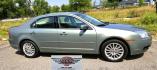2008 Green /Tan Mercury Milan V6 Premier AWD (3MEHM02148R) with an 3.0L V6 DOHC 24V engine, 6A OD transmission, located at 450 N Russell, Missoula, MT, 59801, (406) 543-6600, 46.874496, -114.017433 - Only 94k Miles! You read that right. Classy looking AWD Sedan. 3.0L V6 Engine. 6 Speed Automatic Overdrive Transmission. Air Conditioning that was just serviced. AM FM 6 CD Changer. Bluetooth Phone Connection. Leather Seats.- Photo#1