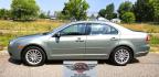 2008 Green /Tan Mercury Milan V6 Premier AWD (3MEHM02148R) with an 3.0L V6 DOHC 24V engine, 6A OD transmission, located at 450 N Russell, Missoula, MT, 59801, (406) 543-6600, 46.874496, -114.017433 - Only 94k Miles! You read that right. Classy looking AWD Sedan. 3.0L V6 Engine. 6 Speed Automatic Overdrive Transmission. Air Conditioning that was just serviced. AM FM 6 CD Changer. Bluetooth Phone Connection. Leather Seats.- Photo#5