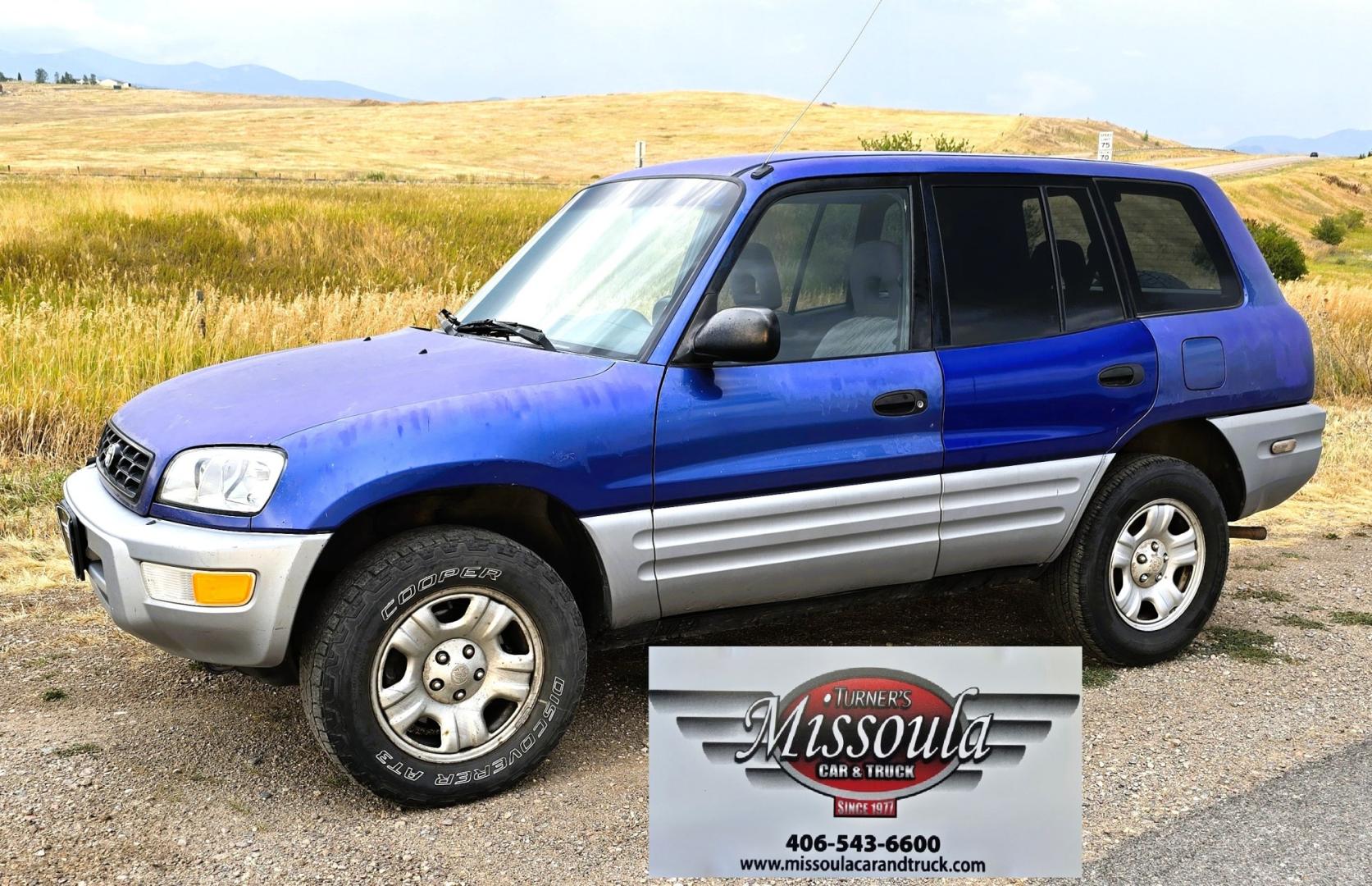 2000 Blue /Blue Toyota RAV4 4-Door 2WD (JT3GP10V0Y0) with an 2.0L L4 DOHC 16V engine, Automatic transmission, located at 450 N Russell, Missoula, MT, 59801, (406) 543-6600, 46.874496, -114.017433 - Great Running Toyota with an impeccable CarFax. 2.0L I4 Engine with a New Timing Belt. Head Gasket and Water Pump less than 10k miles ago. Automatic Transmissions shifts smooth. Air Blows Cold. Has an Aftermarket CD Player. Power Windows and Locks. Has a clean Title and Carfax. The only drawback is- Photo#1