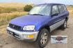 2000 Blue /Blue Toyota RAV4 4-Door 2WD (JT3GP10V0Y0) with an 2.0L L4 DOHC 16V engine, Automatic transmission, located at 450 N Russell, Missoula, MT, 59801, (406) 543-6600, 46.874496, -114.017433 - Great Running Toyota with an impeccable CarFax. 2.0L I4 Engine with a New Timing Belt. Head Gasket and Water Pump less than 10k miles ago. Automatic Transmissions shifts smooth. Air Blows Cold. Has an Aftermarket CD Player. Power Windows and Locks. Has a clean Title and Carfax. The only drawback is- Photo#4