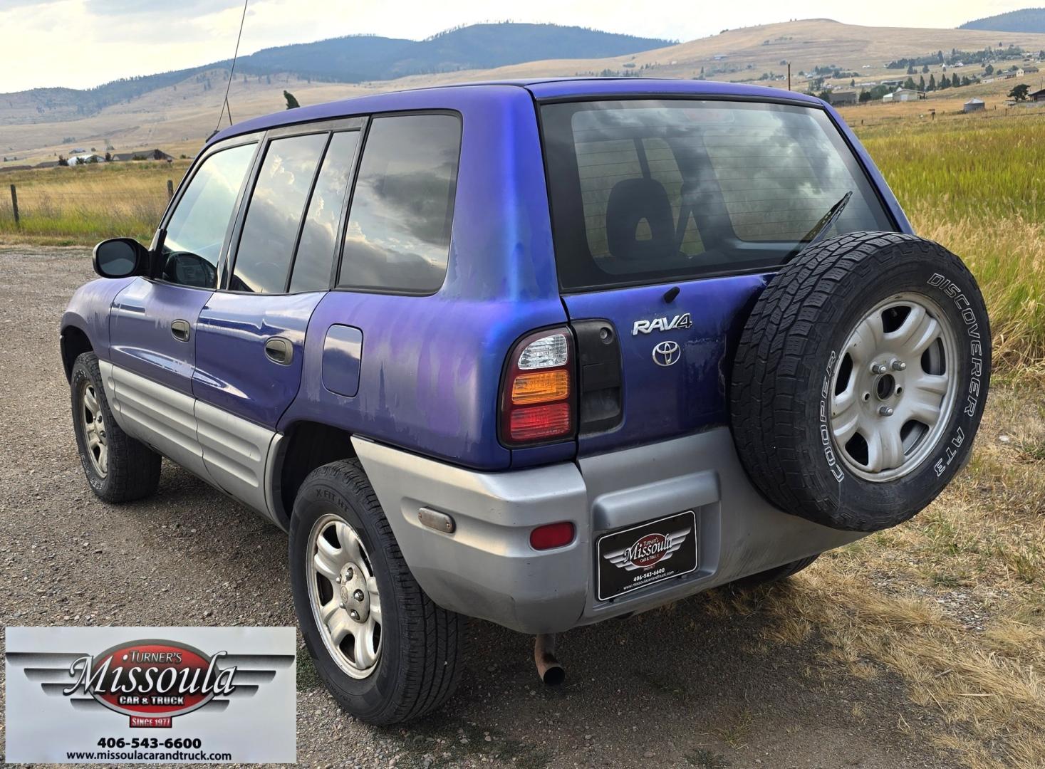 2000 Blue /Blue Toyota RAV4 4-Door 2WD (JT3GP10V0Y0) with an 2.0L L4 DOHC 16V engine, Automatic transmission, located at 450 N Russell, Missoula, MT, 59801, (406) 543-6600, 46.874496, -114.017433 - Great Running Toyota with an impeccable CarFax. 2.0L I4 Engine with a New Timing Belt. Head Gasket and Water Pump less than 10k miles ago. Automatic Transmissions shifts smooth. Air Blows Cold. Has an Aftermarket CD Player. Power Windows and Locks. Has a clean Title and Carfax. The only drawback is- Photo#3