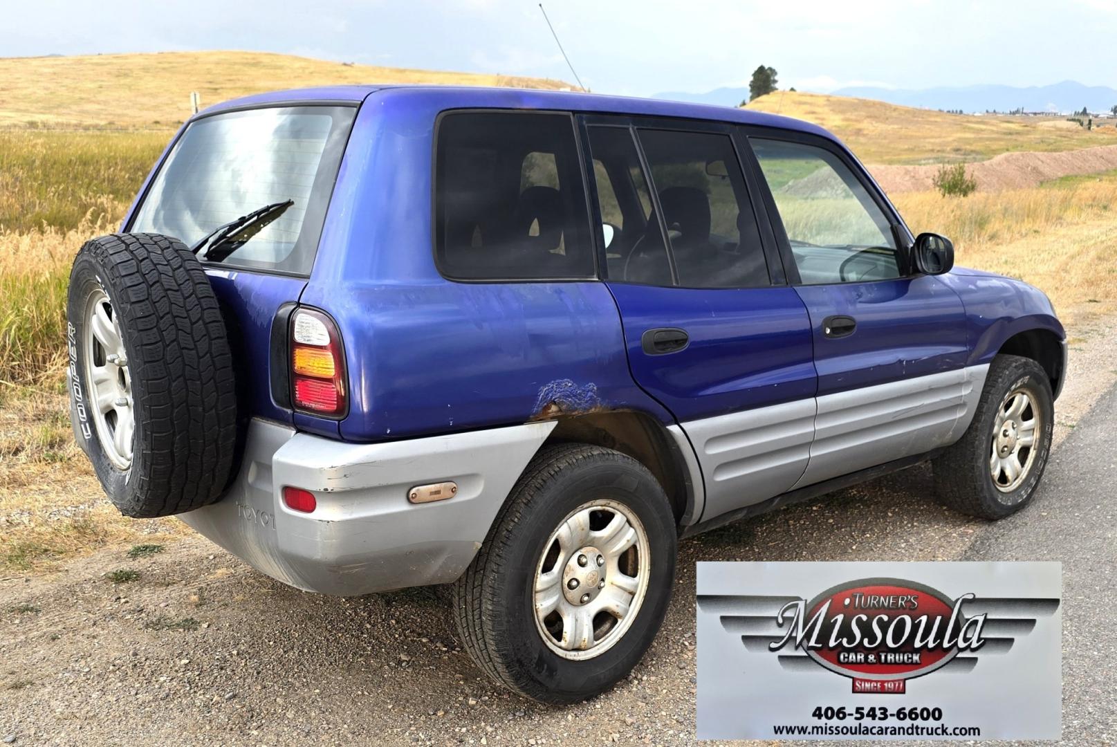 2000 Blue /Blue Toyota RAV4 4-Door 2WD (JT3GP10V0Y0) with an 2.0L L4 DOHC 16V engine, Automatic transmission, located at 450 N Russell, Missoula, MT, 59801, (406) 543-6600, 46.874496, -114.017433 - Great Running Toyota with an impeccable CarFax. 2.0L I4 Engine with a New Timing Belt. Head Gasket and Water Pump less than 10k miles ago. Automatic Transmissions shifts smooth. Air Blows Cold. Has an Aftermarket CD Player. Power Windows and Locks. Has a clean Title and Carfax. The only drawback is- Photo#6