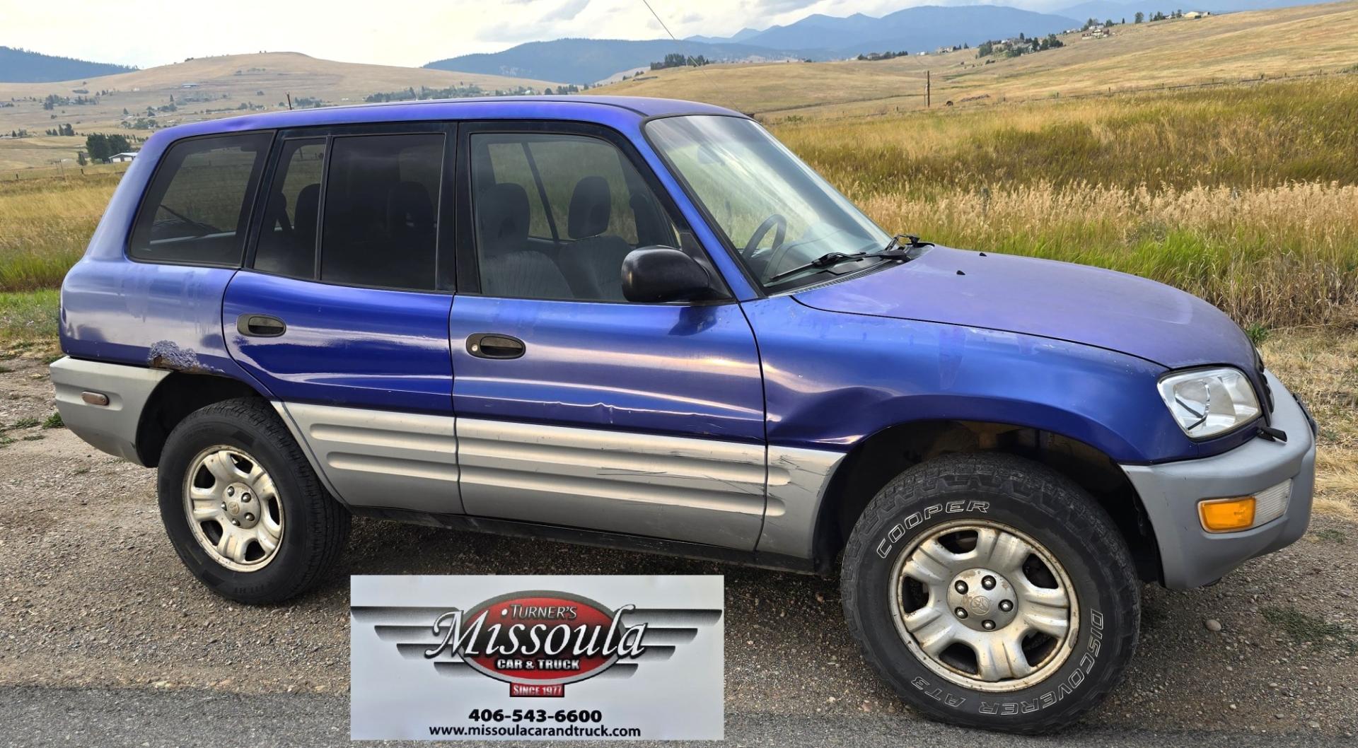 2000 Blue /Blue Toyota RAV4 4-Door 2WD (JT3GP10V0Y0) with an 2.0L L4 DOHC 16V engine, Automatic transmission, located at 450 N Russell, Missoula, MT, 59801, (406) 543-6600, 46.874496, -114.017433 - Great Running Toyota with an impeccable CarFax. 2.0L I4 Engine with a New Timing Belt. Head Gasket and Water Pump less than 10k miles ago. Automatic Transmissions shifts smooth. Air Blows Cold. Has an Aftermarket CD Player. Power Windows and Locks. Has a clean Title and Carfax. The only drawback is- Photo#7