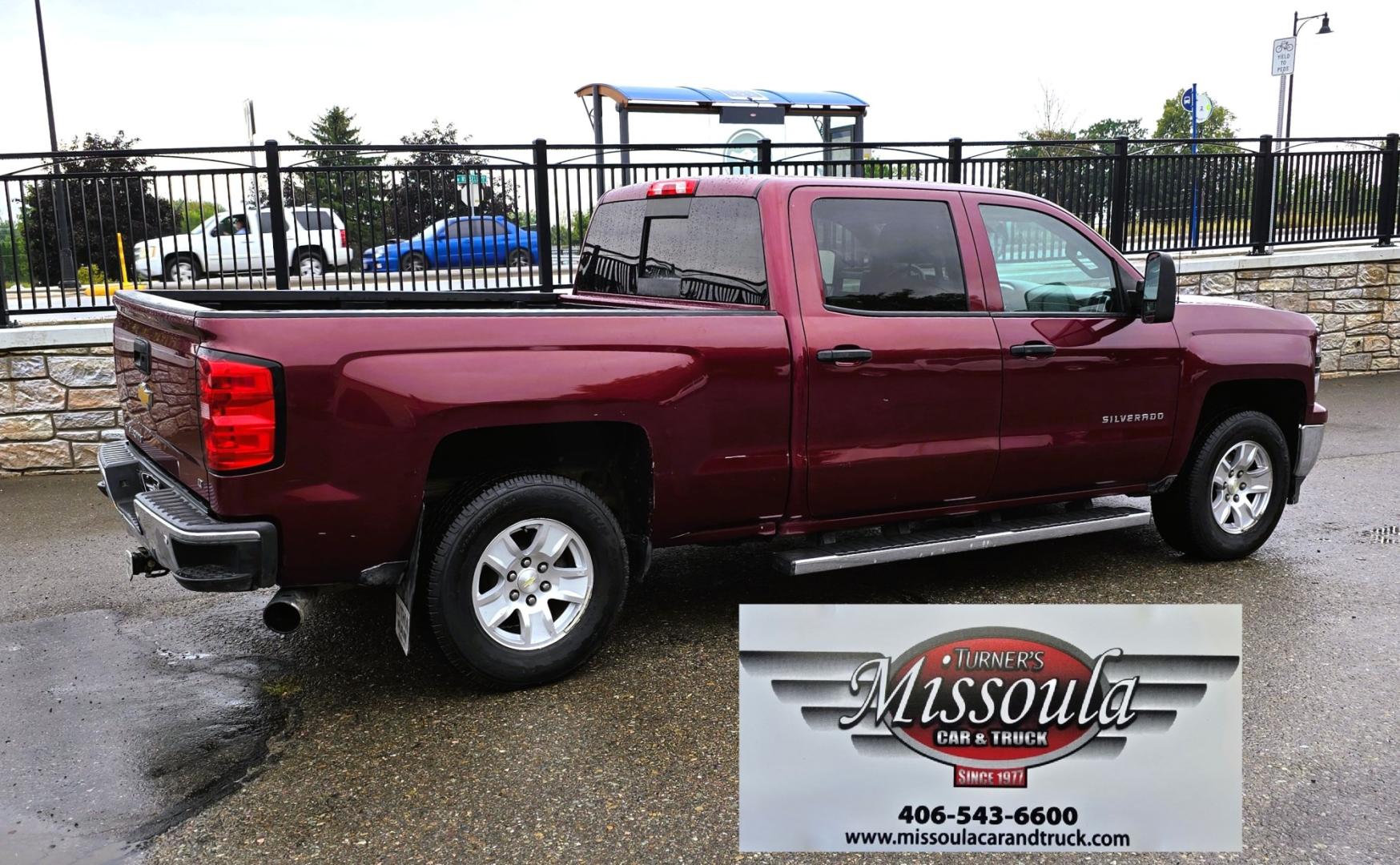 2014 Maroon /Gray Chevrolet Silverado 1500 1LT Crew Cab 4WD (3GCUKREH9EG) with an 4.3L V6 OHV 12V engine, 6-Speed Automatic transmission, located at 450 N Russell, Missoula, MT, 59801, (406) 543-6600, 46.874496, -114.017433 - Sharp Silverado 4WD. Economical 4.V6 Engine. Automatic Transmission. Air. Cruise. Tilt. Power Windows and Locks. Backup Camera. AM FM CD Player. Bluetooth Audio and Phone Connection. Front Seats are Power and Heated. Running Board. Paint has some scratches.- Photo#7
