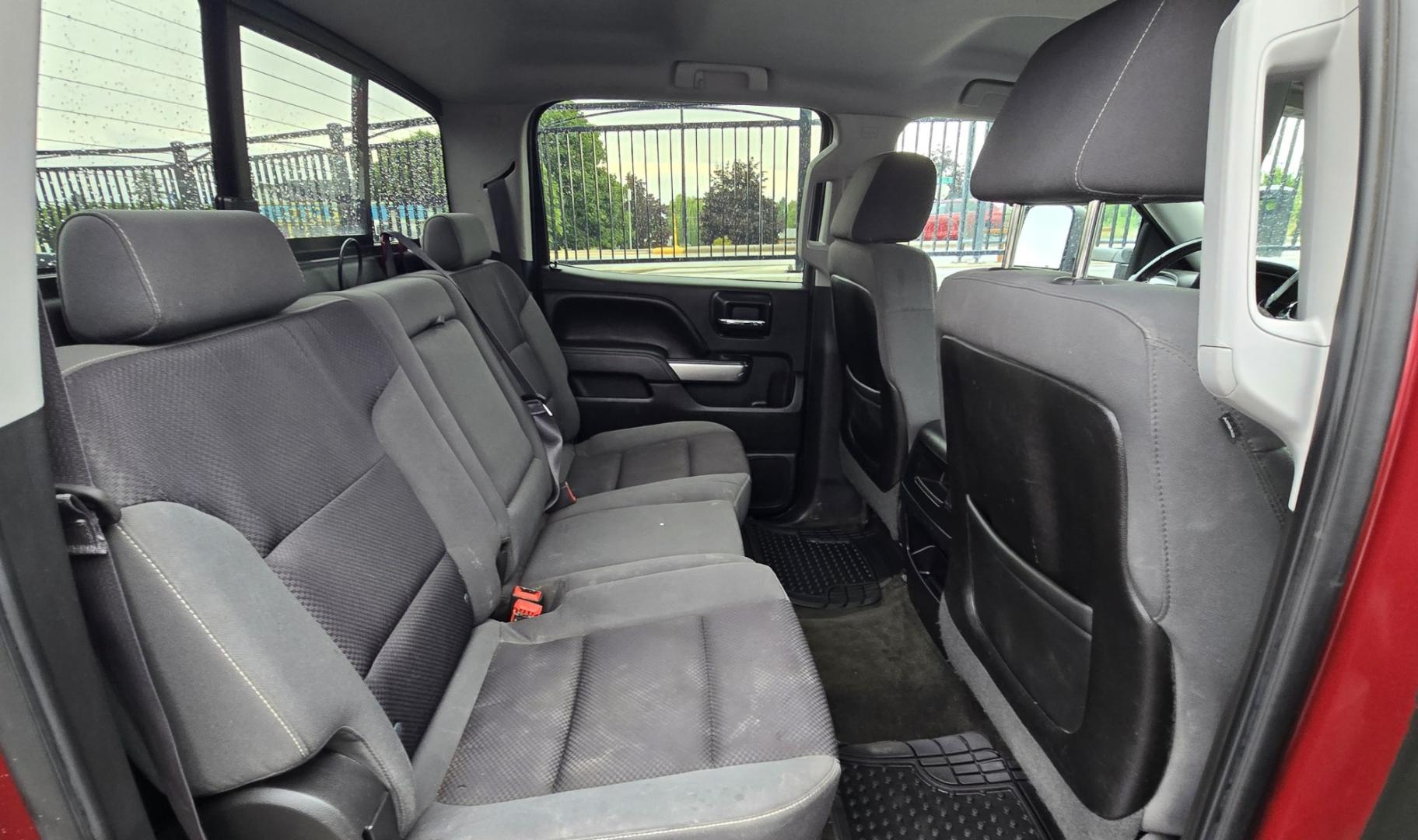 2014 Maroon /Gray Chevrolet Silverado 1500 1LT Crew Cab 4WD (3GCUKREH9EG) with an 4.3L V6 OHV 12V engine, 6-Speed Automatic transmission, located at 450 N Russell, Missoula, MT, 59801, (406) 543-6600, 46.874496, -114.017433 - Sharp Silverado 4WD. Economical 4.V6 Engine. Automatic Transmission. Air. Cruise. Tilt. Power Windows and Locks. Backup Camera. AM FM CD Player. Bluetooth Audio and Phone Connection. Front Seats are Power and Heated. Running Board. Paint has some scratches.- Photo#11