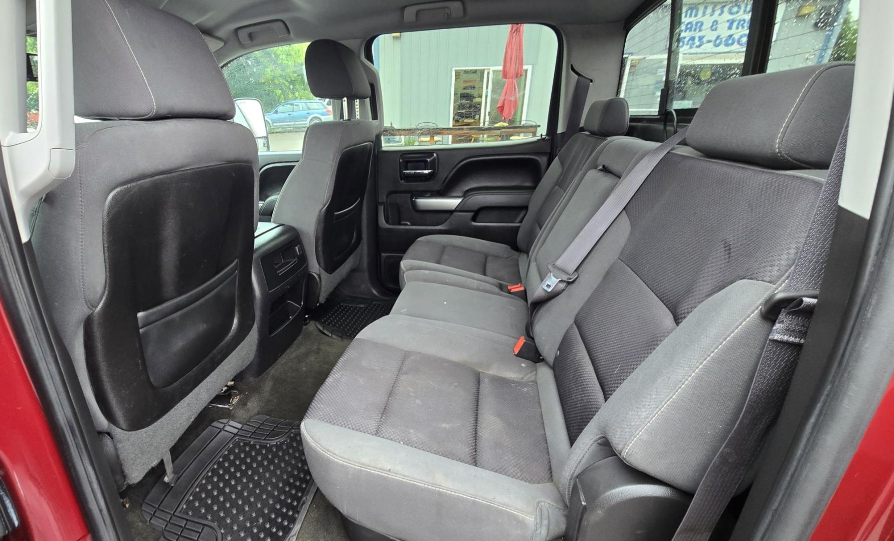 2014 Maroon /Gray Chevrolet Silverado 1500 1LT Crew Cab 4WD (3GCUKREH9EG) with an 4.3L V6 OHV 12V engine, 6-Speed Automatic transmission, located at 450 N Russell, Missoula, MT, 59801, (406) 543-6600, 46.874496, -114.017433 - Sharp Silverado 4WD. Economical 4.V6 Engine. Automatic Transmission. Air. Cruise. Tilt. Power Windows and Locks. Backup Camera. AM FM CD Player. Bluetooth Audio and Phone Connection. Front Seats are Power and Heated. Running Board. Paint has some scratches.- Photo#13