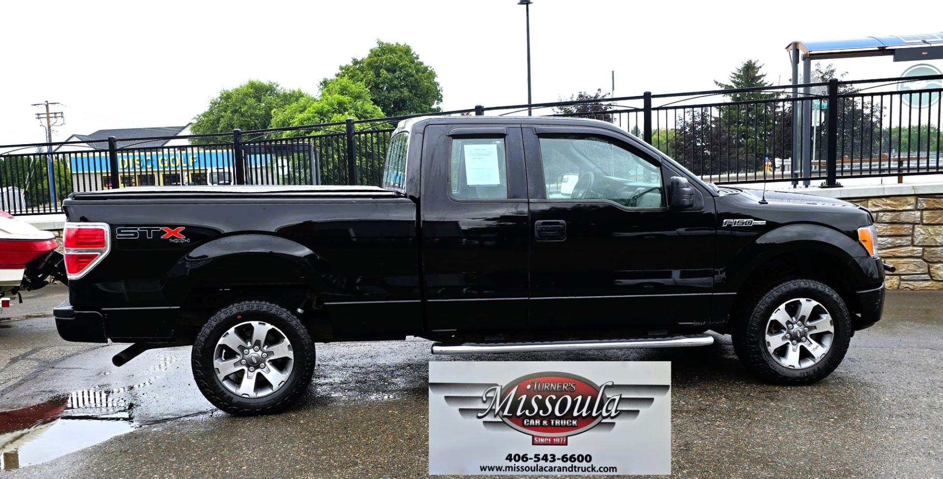 2011 Black /Gray Ford F-150 STX SuperCab 6.5-ft. Bed 4WD (1FTFX1EFXBF) with an 5.0L V8 engine, Automatic transmission, located at 450 N Russell, Missoula, MT, 59801, (406) 543-6600, 46.874496, -114.017433 - Ford F-150 STX 4WD Extended Cab. 5.0L V8 Engine. Automatic Transmission. Great Miles with only 104,500 miles. Air, Cruise and Tilt. AM FM CD Player. Bluetooth Phone Connection. Nice Goodyear Tires. Running Boards.- Photo#4