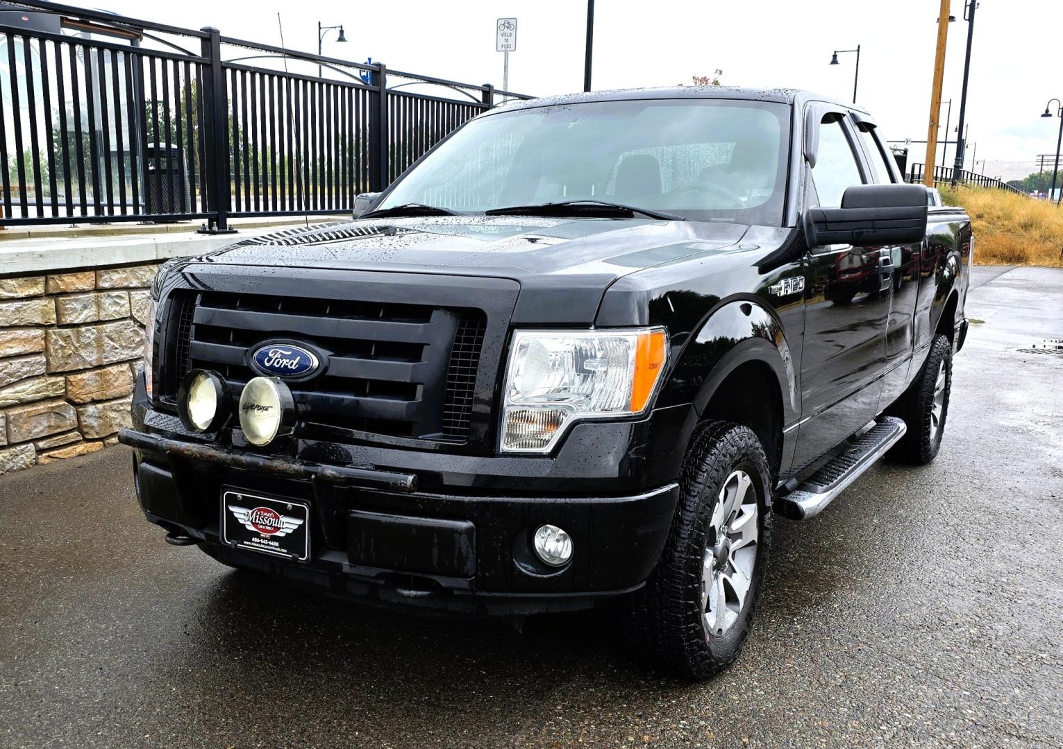 2011 Black /Gray Ford F-150 STX SuperCab 6.5-ft. Bed 4WD (1FTFX1EFXBF) with an 5.0L V8 engine, Automatic transmission, located at 450 N Russell, Missoula, MT, 59801, (406) 543-6600, 46.874496, -114.017433 - Ford F-150 STX 4WD Extended Cab. 5.0L V8 Engine. Automatic Transmission. Great Miles with only 104,500 miles. Air, Cruise and Tilt. AM FM CD Player. Bluetooth Phone Connection. Nice Goodyear Tires. Running Boards.- Photo#3