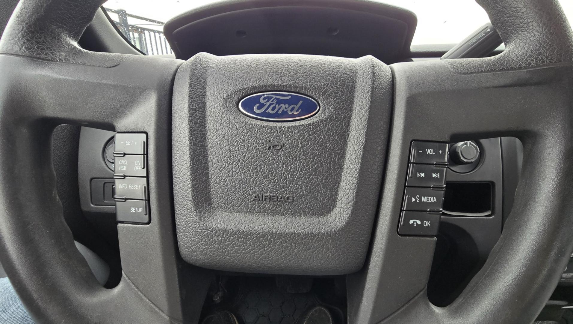 2011 Black /Gray Ford F-150 STX SuperCab 6.5-ft. Bed 4WD (1FTFX1EFXBF) with an 5.0L V8 engine, Automatic transmission, located at 450 N Russell, Missoula, MT, 59801, (406) 543-6600, 46.874496, -114.017433 - Ford F-150 STX 4WD Extended Cab. 5.0L V8 Engine. Automatic Transmission. Great Miles with only 104,500 miles. Air, Cruise and Tilt. AM FM CD Player. Bluetooth Phone Connection. Nice Goodyear Tires. Running Boards.- Photo#12
