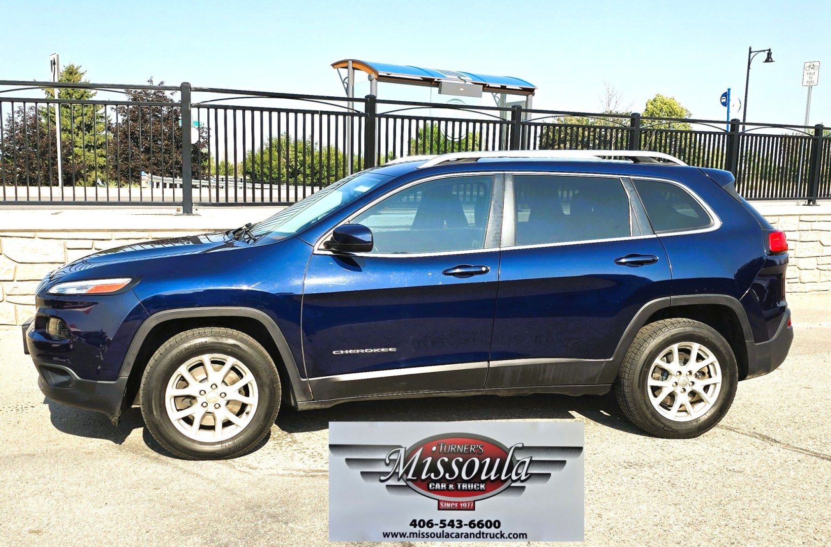 2015 Blue /Black Jeep Cherokee Latitude 4WD (1C4PJMCB2FW) with an 2.4L L4 DOHC 16V engine, 9A transmission, located at 450 N Russell, Missoula, MT, 59801, (406) 543-6600, 46.874496, -114.017433 - Gorgeous Blue 4WD SUV. Economical yet Peppy 2.4L I4 Engine. Automatic Transmission. Frigid Air Conditioning. Tilt and Telescoping Steering Wheel. Power Windows and Locks. Remote Start. AM FM XM Touchscreen Stereo with Bluetooth Audio and Phone Connection. Backup Camera. Heated Seats and Steering Whe- Photo#5