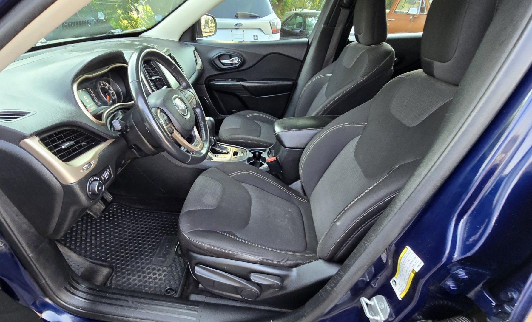2015 Blue /Black Jeep Cherokee Latitude 4WD (1C4PJMCB2FW) with an 2.4L L4 DOHC 16V engine, 9A transmission, located at 450 N Russell, Missoula, MT, 59801, (406) 543-6600, 46.874496, -114.017433 - Gorgeous Blue 4WD SUV. Economical yet Peppy 2.4L I4 Engine. Automatic Transmission. Frigid Air Conditioning. Tilt and Telescoping Steering Wheel. Power Windows and Locks. Remote Start. AM FM XM Touchscreen Stereo with Bluetooth Audio and Phone Connection. Backup Camera. Heated Seats and Steering Whe- Photo#12