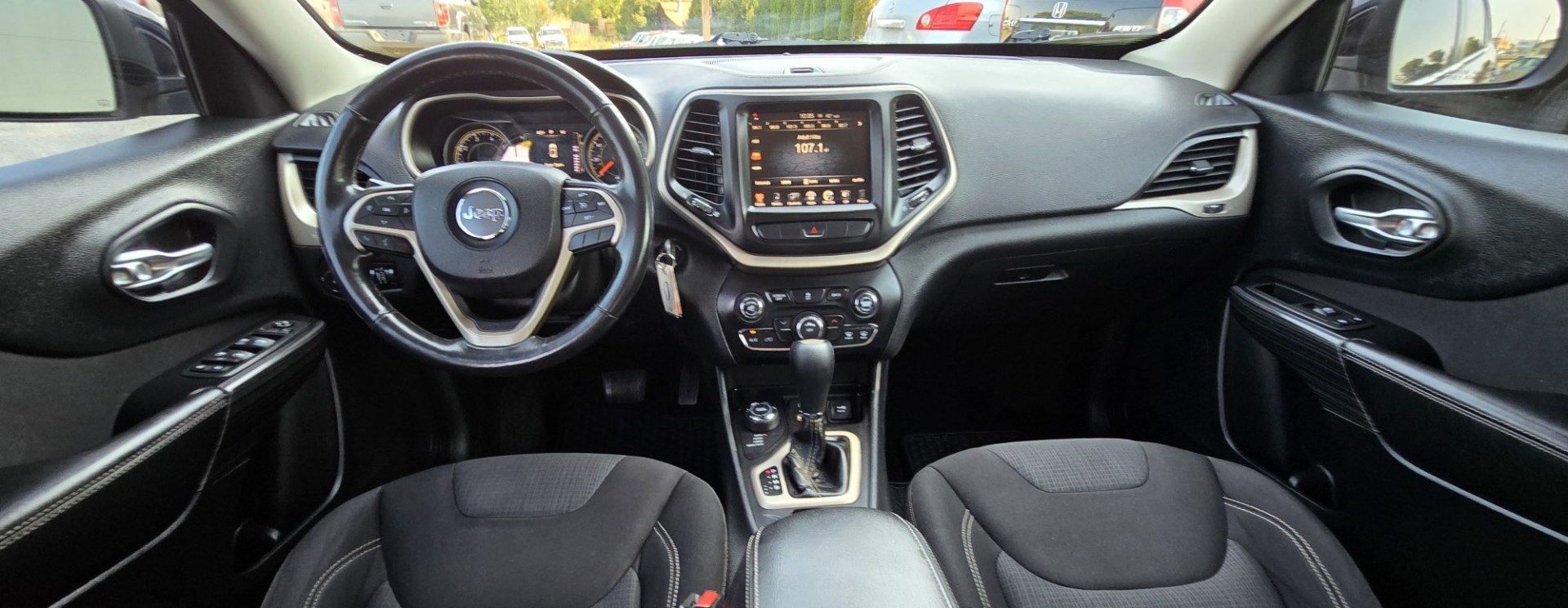 2015 Blue /Black Jeep Cherokee Latitude 4WD (1C4PJMCB2FW) with an 2.4L L4 DOHC 16V engine, 9A transmission, located at 450 N Russell, Missoula, MT, 59801, (406) 543-6600, 46.874496, -114.017433 - Gorgeous Blue 4WD SUV. Economical yet Peppy 2.4L I4 Engine. Automatic Transmission. Frigid Air Conditioning. Tilt and Telescoping Steering Wheel. Power Windows and Locks. Remote Start. AM FM XM Touchscreen Stereo with Bluetooth Audio and Phone Connection. Backup Camera. Heated Seats and Steering Whe- Photo#14