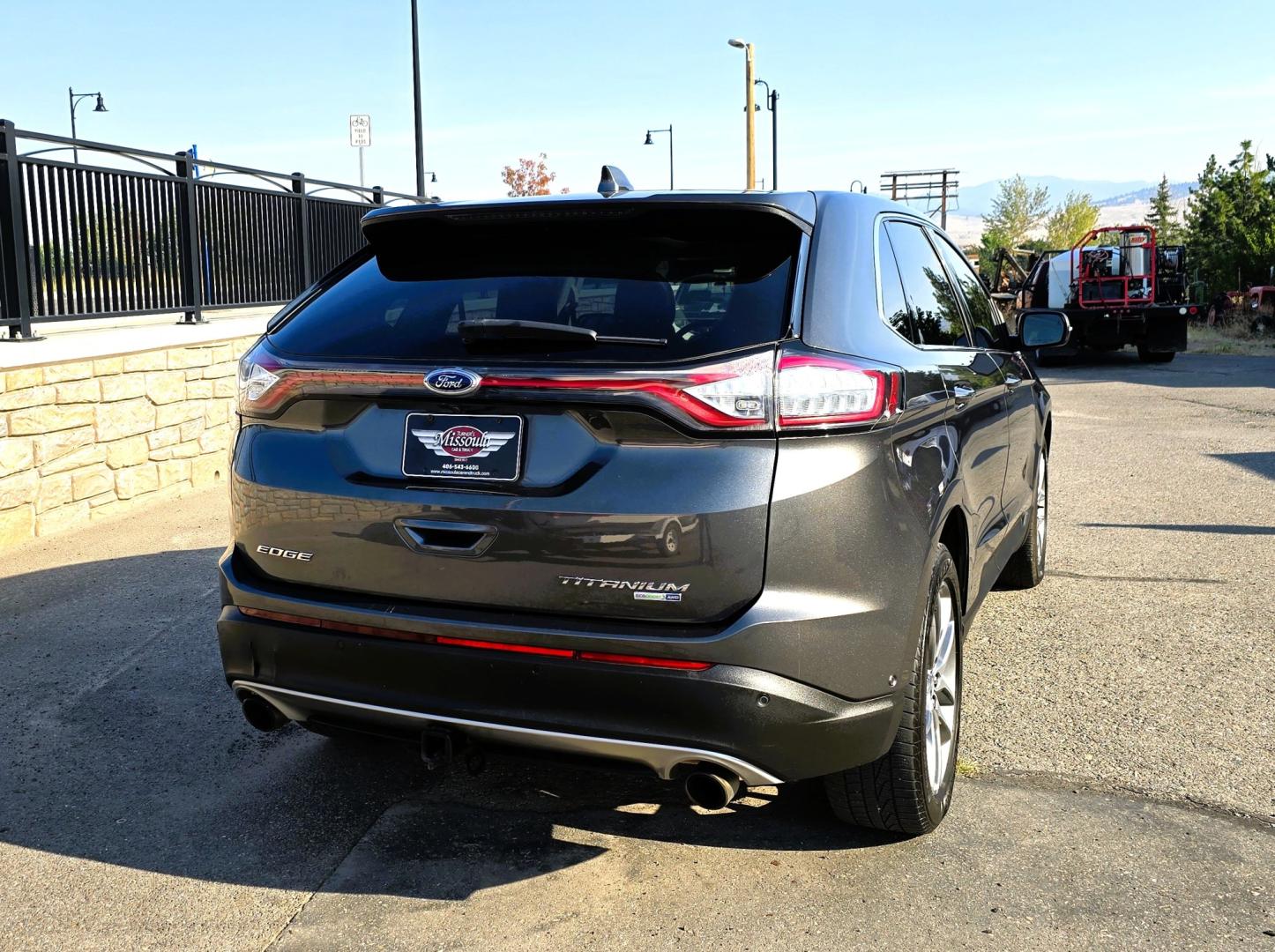 2017 Charcoal /Black Ford Edge Titanium AWD (2FMPK4K92HB) with an 2.0L L4 DOHC 16V engine, 6A transmission, located at 450 N Russell, Missoula, MT, 59801, (406) 543-6600, 46.874496, -114.017433 - One of the Nicest Used Vehicles in Missoula. One Owner. Only 85K Miles on the 2.0L I4 Engine. 6 Speed Automatic Transmission. All Wheel Drive. Huge Panoramic Sunroof. Leather Interior. Front Power Seats that are both Heated and Cooled. Rear Seats are Heated. Heated Steering Wheel. Navigation. Adapti- Photo#6