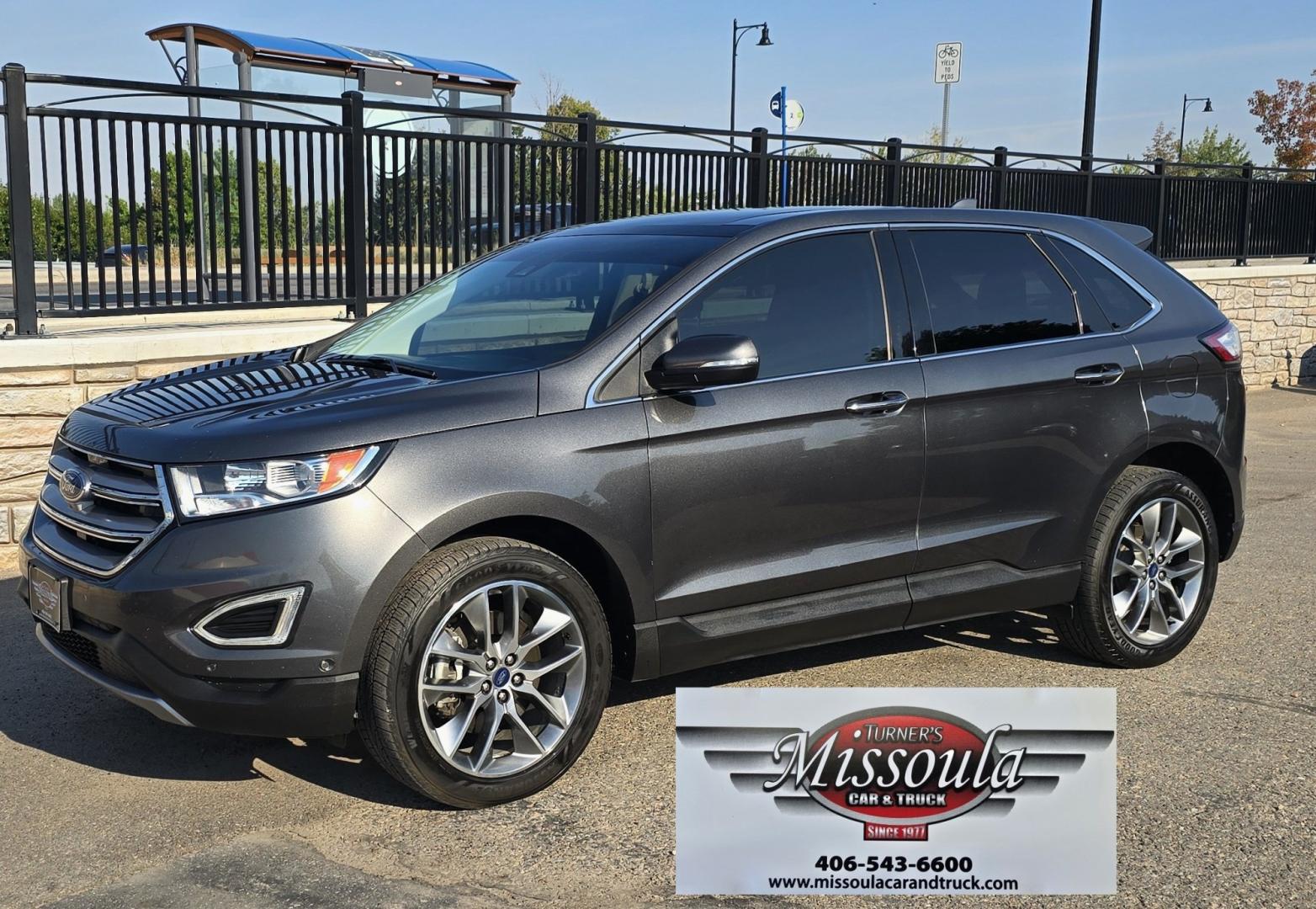 2017 Charcoal /Black Ford Edge Titanium AWD (2FMPK4K92HB) with an 2.0L L4 DOHC 16V engine, 6A transmission, located at 450 N Russell, Missoula, MT, 59801, (406) 543-6600, 46.874496, -114.017433 - One of the Nicest Used Vehicles in Missoula. One Owner. Only 85K Miles on the 2.0L I4 Engine. 6 Speed Automatic Transmission. All Wheel Drive. Huge Panoramic Sunroof. Leather Interior. Front Power Seats that are both Heated and Cooled. Rear Seats are Heated. Heated Steering Wheel. Navigation. Adapti- Photo#0