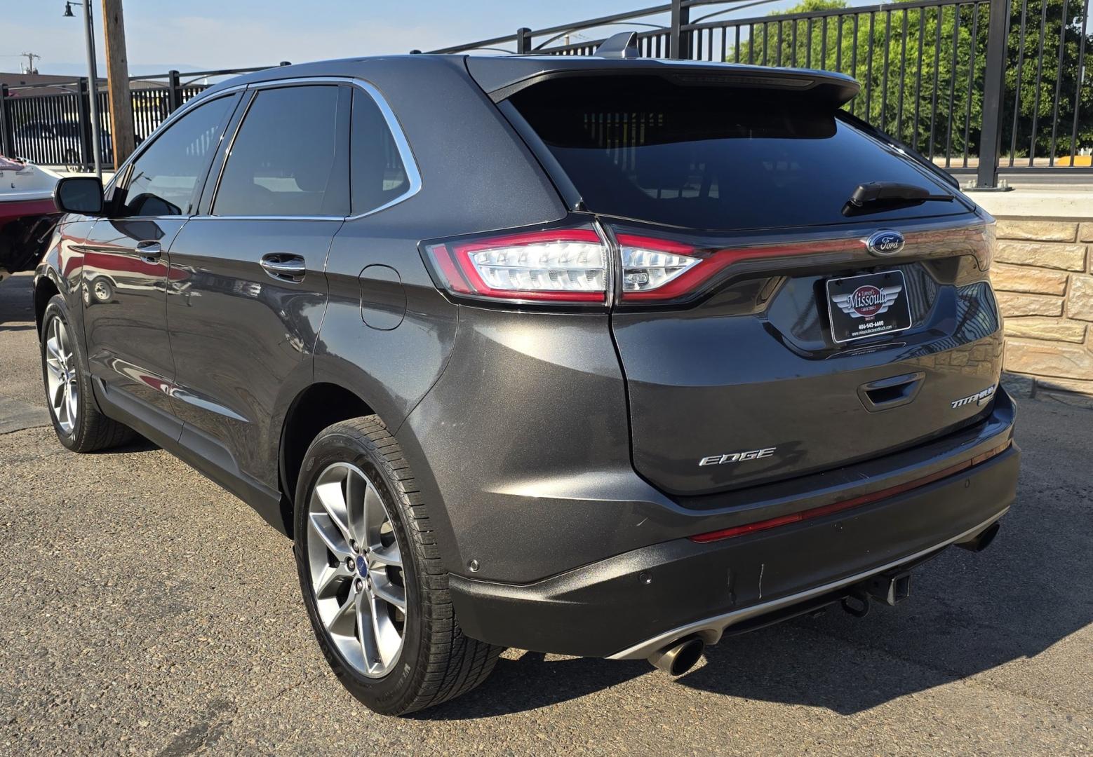 2017 Charcoal /Black Ford Edge Titanium AWD (2FMPK4K92HB) with an 2.0L L4 DOHC 16V engine, 6A transmission, located at 450 N Russell, Missoula, MT, 59801, (406) 543-6600, 46.874496, -114.017433 - One of the Nicest Used Vehicles in Missoula. One Owner. Only 85K Miles on the 2.0L I4 Engine. 6 Speed Automatic Transmission. All Wheel Drive. Huge Panoramic Sunroof. Leather Interior. Front Power Seats that are both Heated and Cooled. Rear Seats are Heated. Heated Steering Wheel. Navigation. Adapti- Photo#8