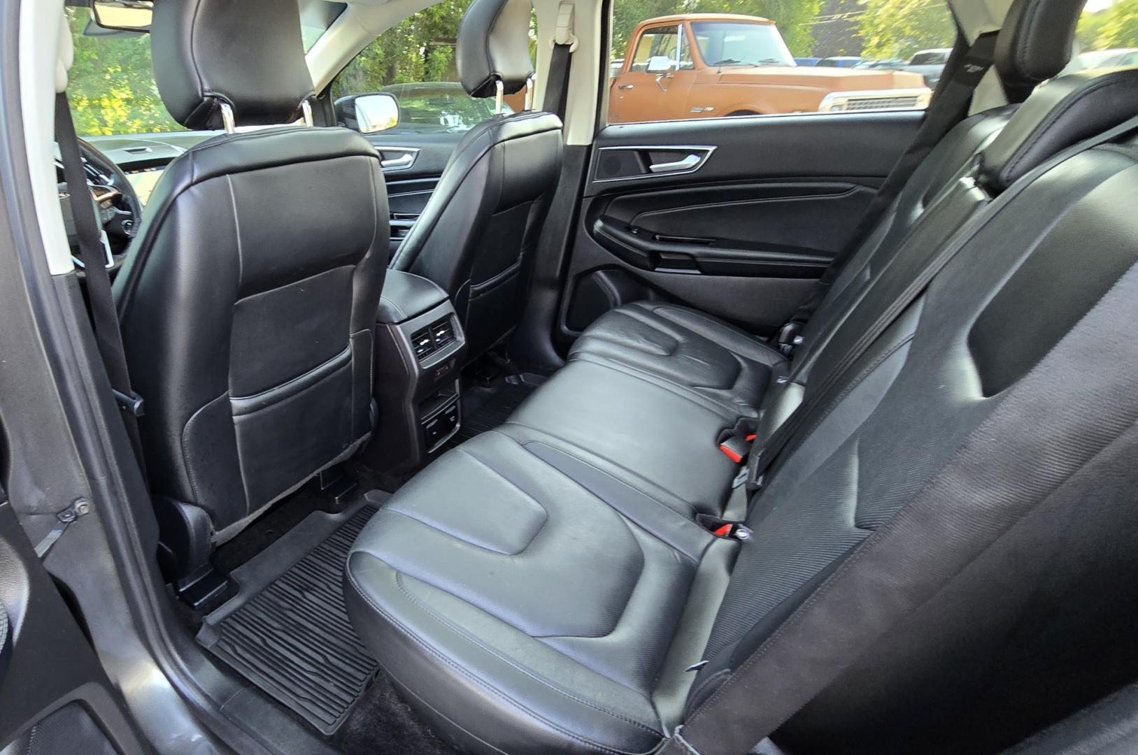 2017 Charcoal /Black Ford Edge Titanium AWD (2FMPK4K92HB) with an 2.0L L4 DOHC 16V engine, 6A transmission, located at 450 N Russell, Missoula, MT, 59801, (406) 543-6600, 46.874496, -114.017433 - One of the Nicest Used Vehicles in Missoula. One Owner. Only 85K Miles on the 2.0L I4 Engine. 6 Speed Automatic Transmission. All Wheel Drive. Huge Panoramic Sunroof. Leather Interior. Front Power Seats that are both Heated and Cooled. Rear Seats are Heated. Heated Steering Wheel. Navigation. Adapti- Photo#10