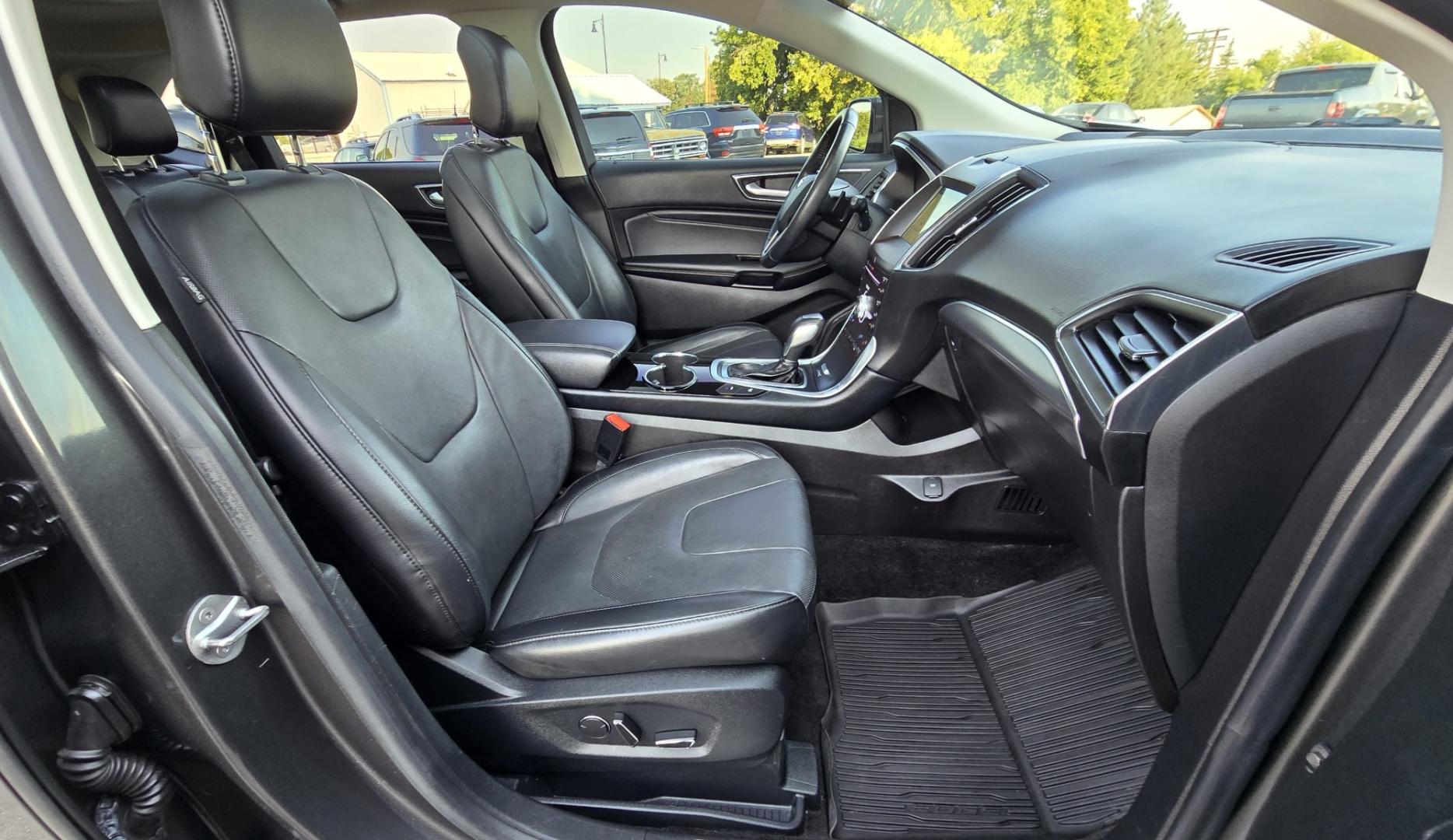 2017 Charcoal /Black Ford Edge Titanium AWD (2FMPK4K92HB) with an 2.0L L4 DOHC 16V engine, 6A transmission, located at 450 N Russell, Missoula, MT, 59801, (406) 543-6600, 46.874496, -114.017433 - One of the Nicest Used Vehicles in Missoula. One Owner. Only 85K Miles on the 2.0L I4 Engine. 6 Speed Automatic Transmission. All Wheel Drive. Huge Panoramic Sunroof. Leather Interior. Front Power Seats that are both Heated and Cooled. Rear Seats are Heated. Heated Steering Wheel. Navigation. Adapti- Photo#11