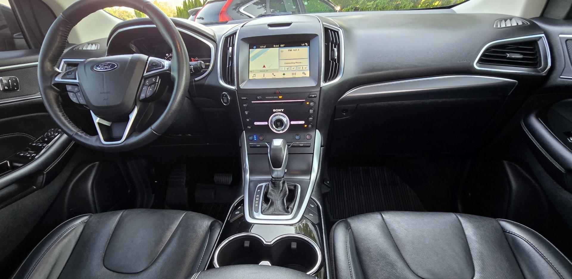 2017 Charcoal /Black Ford Edge Titanium AWD (2FMPK4K92HB) with an 2.0L L4 DOHC 16V engine, 6A transmission, located at 450 N Russell, Missoula, MT, 59801, (406) 543-6600, 46.874496, -114.017433 - One of the Nicest Used Vehicles in Missoula. One Owner. Only 85K Miles on the 2.0L I4 Engine. 6 Speed Automatic Transmission. All Wheel Drive. Huge Panoramic Sunroof. Leather Interior. Front Power Seats that are both Heated and Cooled. Rear Seats are Heated. Heated Steering Wheel. Navigation. Adapti- Photo#13