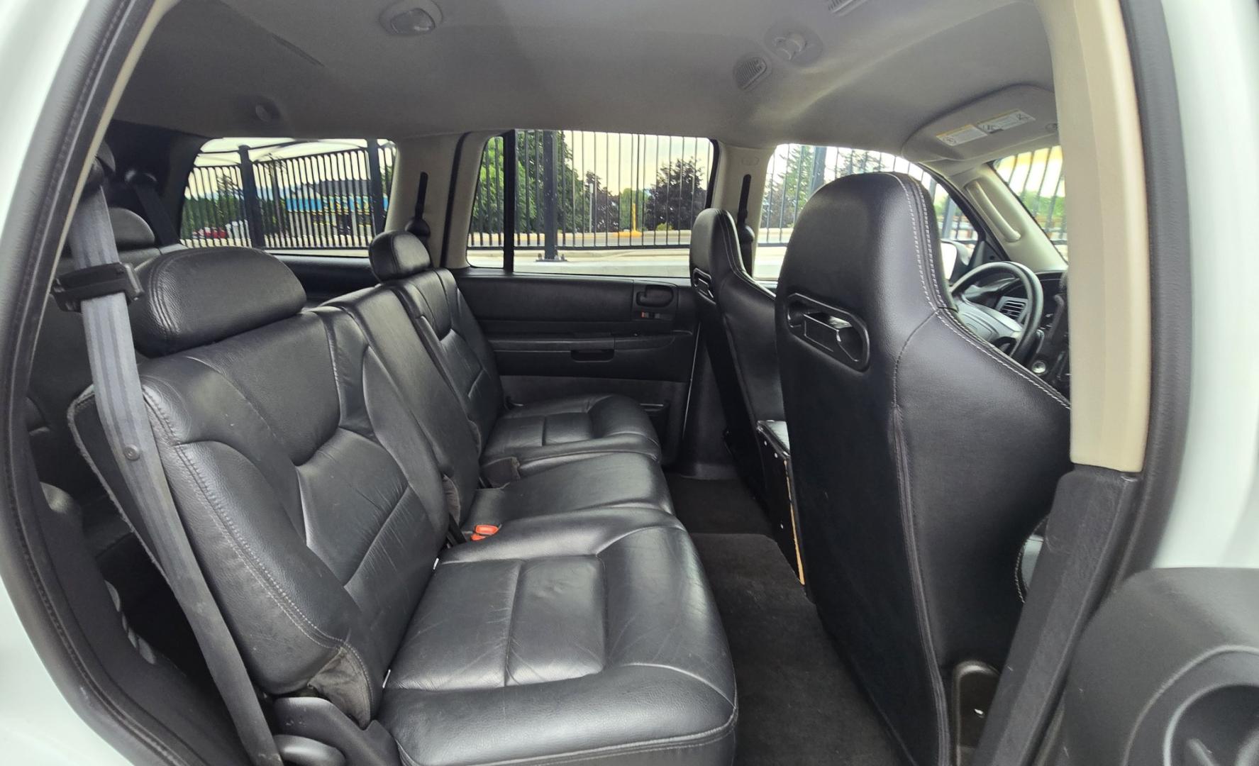 2003 White /Black Dodge Durango SLT 4WD (1D4HS48N03F) with an 4.7L V8 SOHC 16V engine, located at 450 N Russell, Missoula, MT, 59801, (406) 543-6600, 46.874496, -114.017433 - Ready to Go Four Wheeling! Excellent Running 4WD SUV. 4.7L V8 Engine. Automatic Transmission. Aftermarket Front and rear Bumper. Racing Front Seats. 3rd Row Seating. Aftermarket Stereo with Add On Touch Screen. Bluetooth. Air Conditioning. Power Windows and Locks.- Photo#9