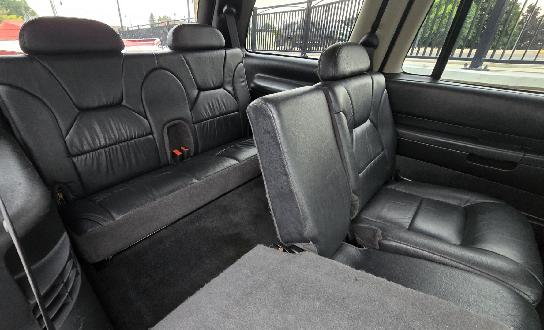 2003 White /Black Dodge Durango SLT 4WD (1D4HS48N03F) with an 4.7L V8 SOHC 16V engine, located at 450 N Russell, Missoula, MT, 59801, (406) 543-6600, 46.874496, -114.017433 - Ready to Go Four Wheeling! Excellent Running 4WD SUV. 4.7L V8 Engine. Automatic Transmission. Aftermarket Front and rear Bumper. Racing Front Seats. 3rd Row Seating. Aftermarket Stereo with Add On Touch Screen. Bluetooth. Air Conditioning. Power Windows and Locks.- Photo#10