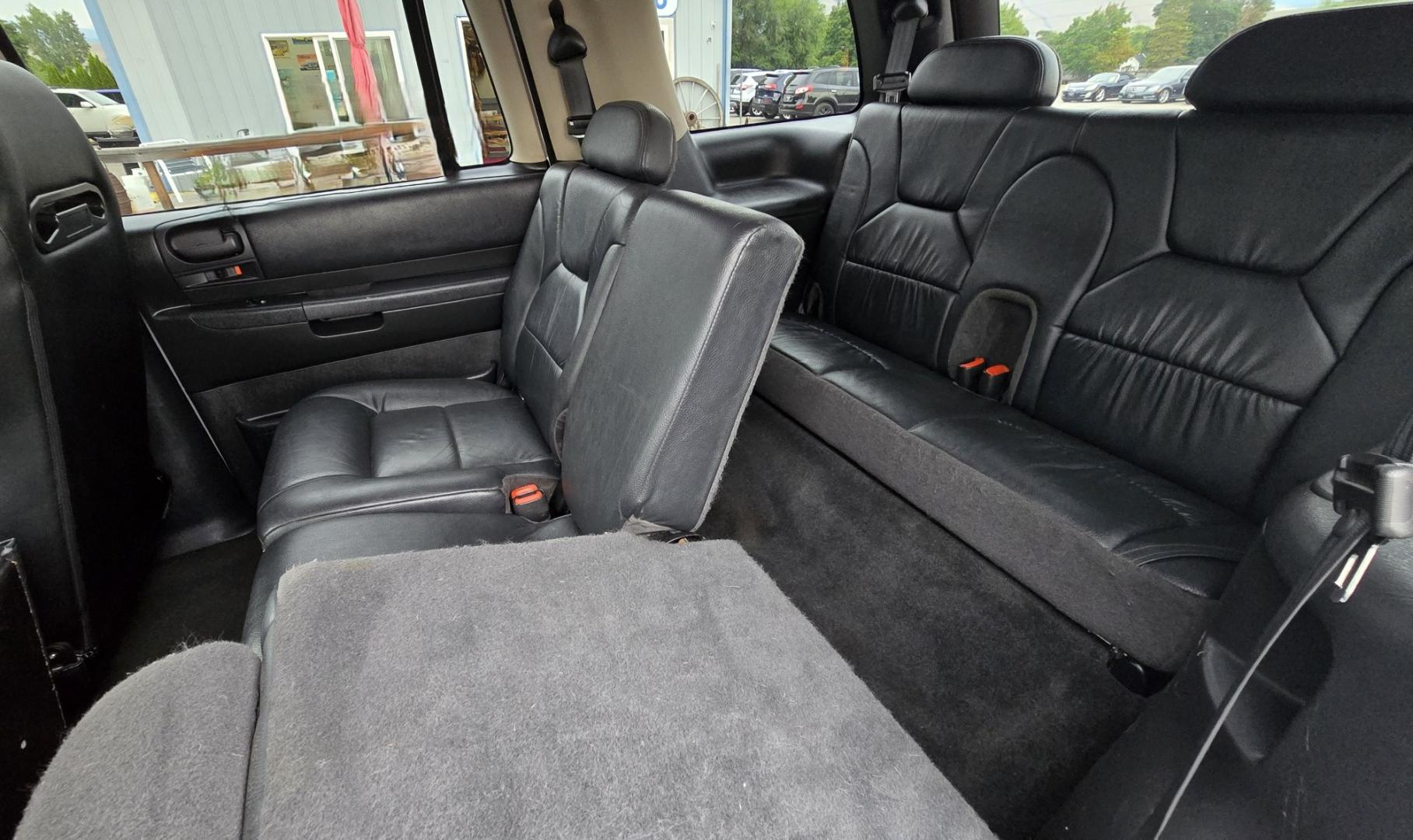 2003 White /Black Dodge Durango SLT 4WD (1D4HS48N03F) with an 4.7L V8 SOHC 16V engine, located at 450 N Russell, Missoula, MT, 59801, (406) 543-6600, 46.874496, -114.017433 - Ready to Go Four Wheeling! Excellent Running 4WD SUV. 4.7L V8 Engine. Automatic Transmission. Aftermarket Front and rear Bumper. Racing Front Seats. 3rd Row Seating. Aftermarket Stereo with Add On Touch Screen. Bluetooth. Air Conditioning. Power Windows and Locks.- Photo#12